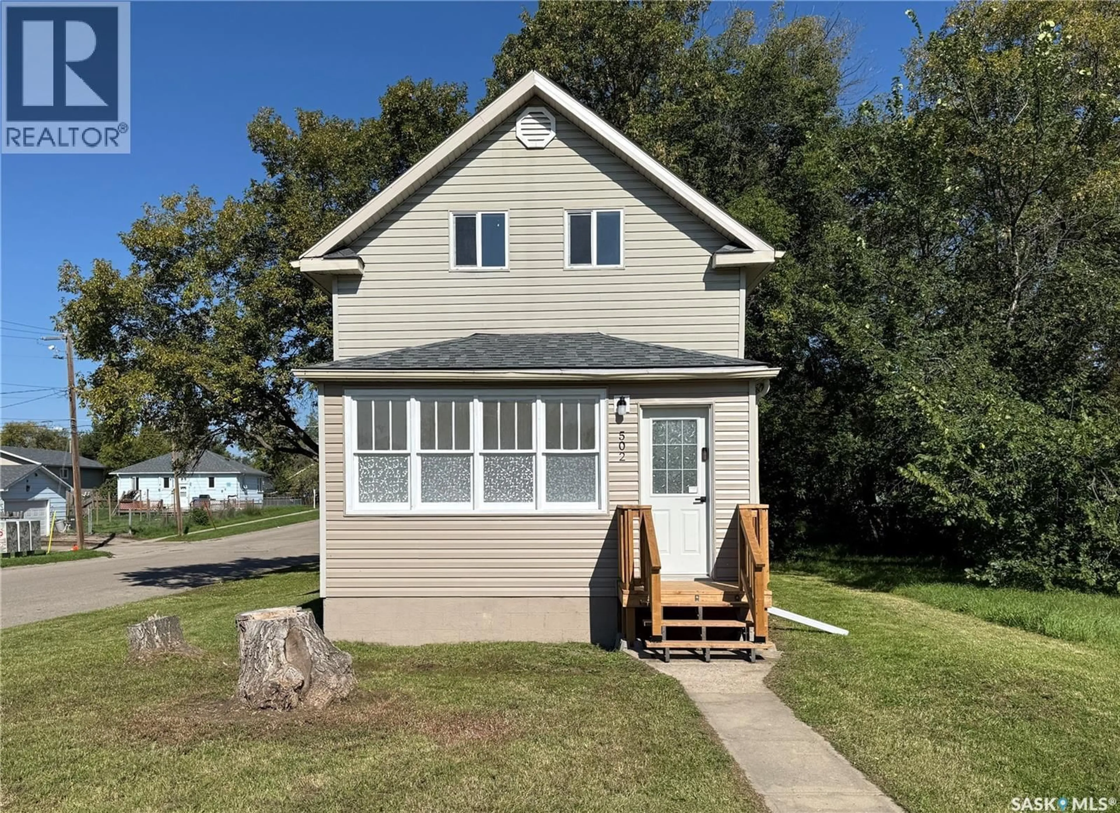 Home with vinyl exterior material, street for 502 8TH STREET, Prince Albert Saskatchewan S6V0W6