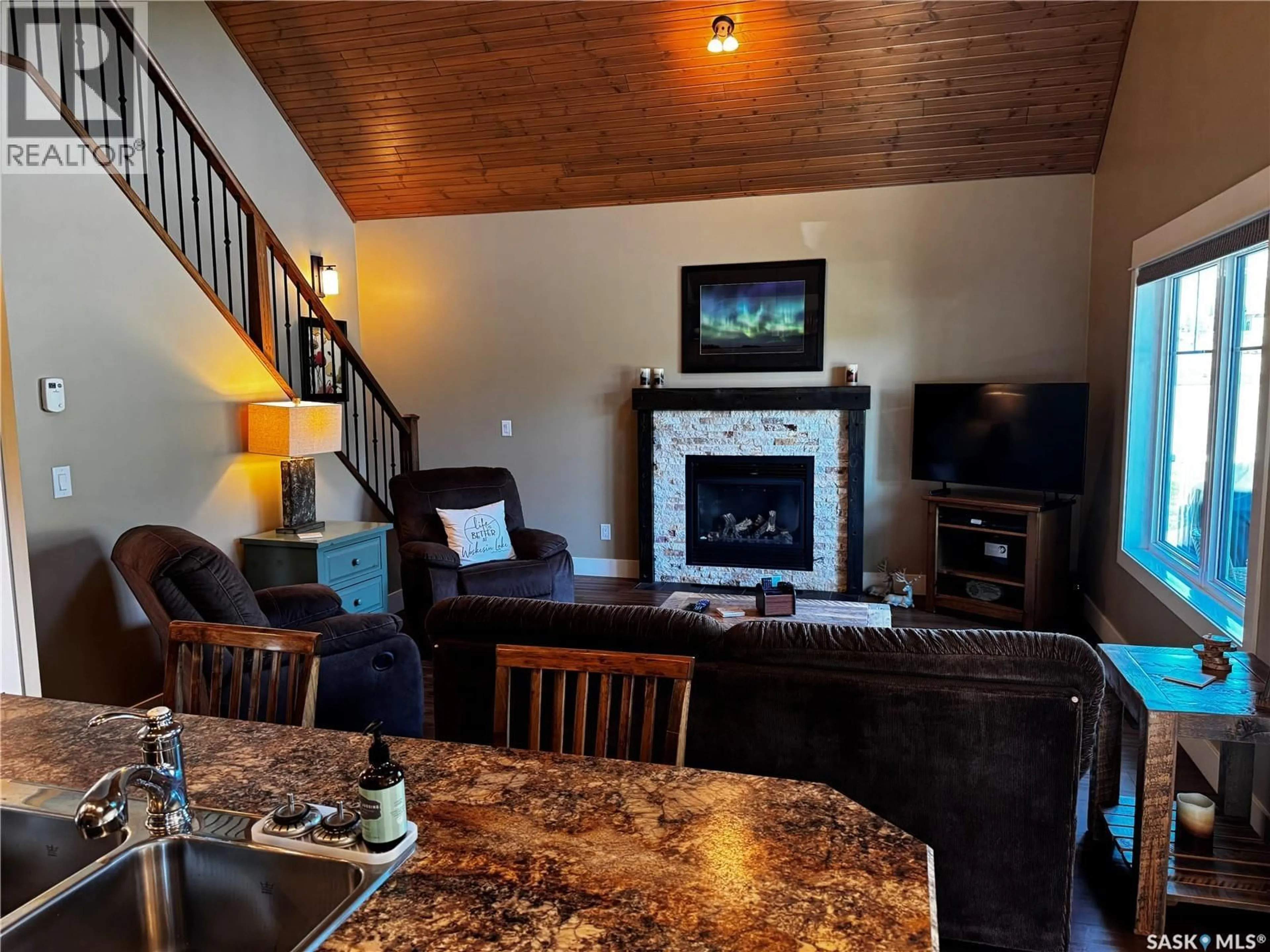 Living room with furniture, unknown for 11 COTTAGE CRESCENT, Elk Ridge Saskatchewan S0J2Y0