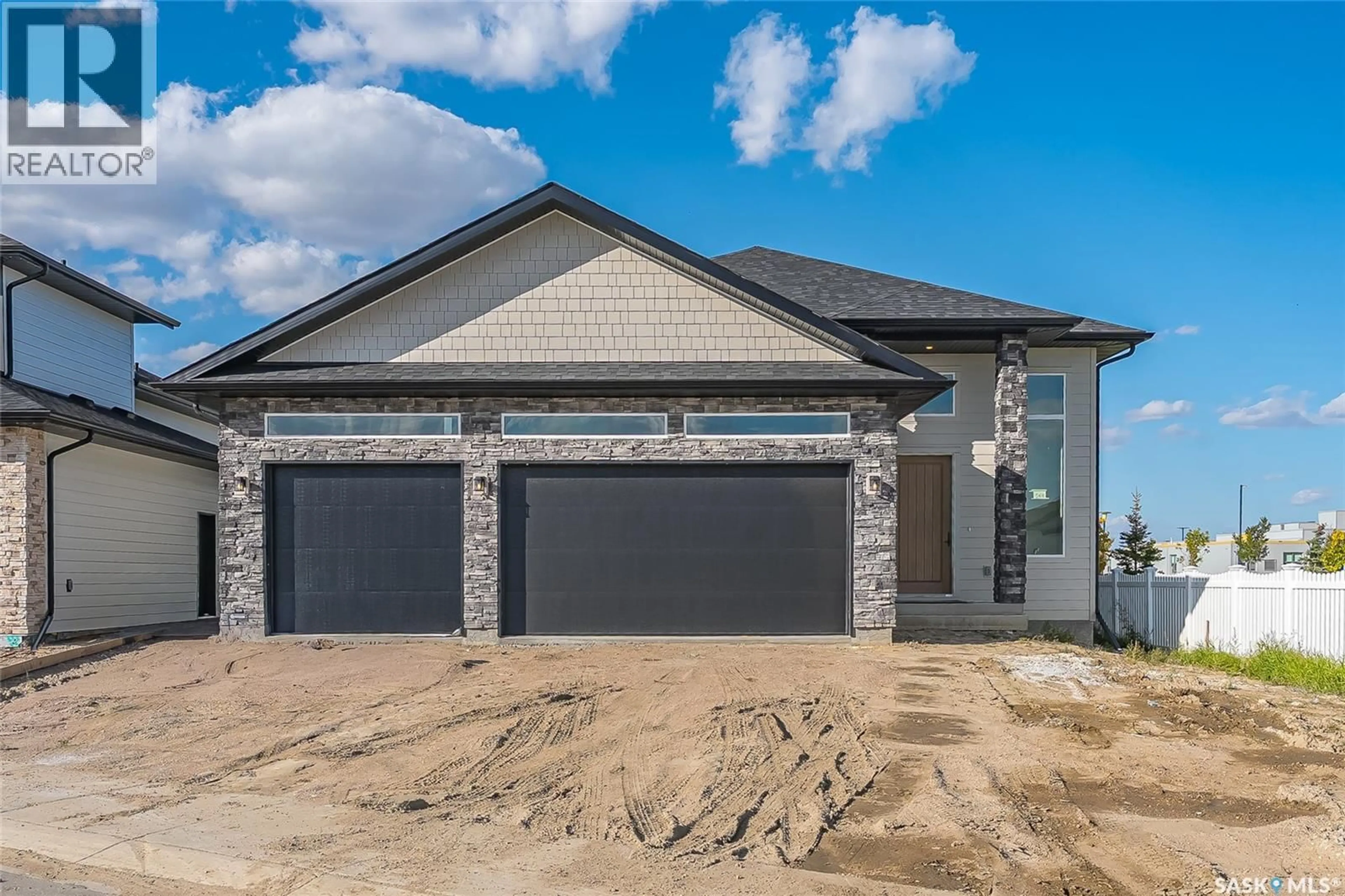 Home with brick exterior material, street for 430 AUGUSTA BOULEVARD, Warman Saskatchewan S0K4S3