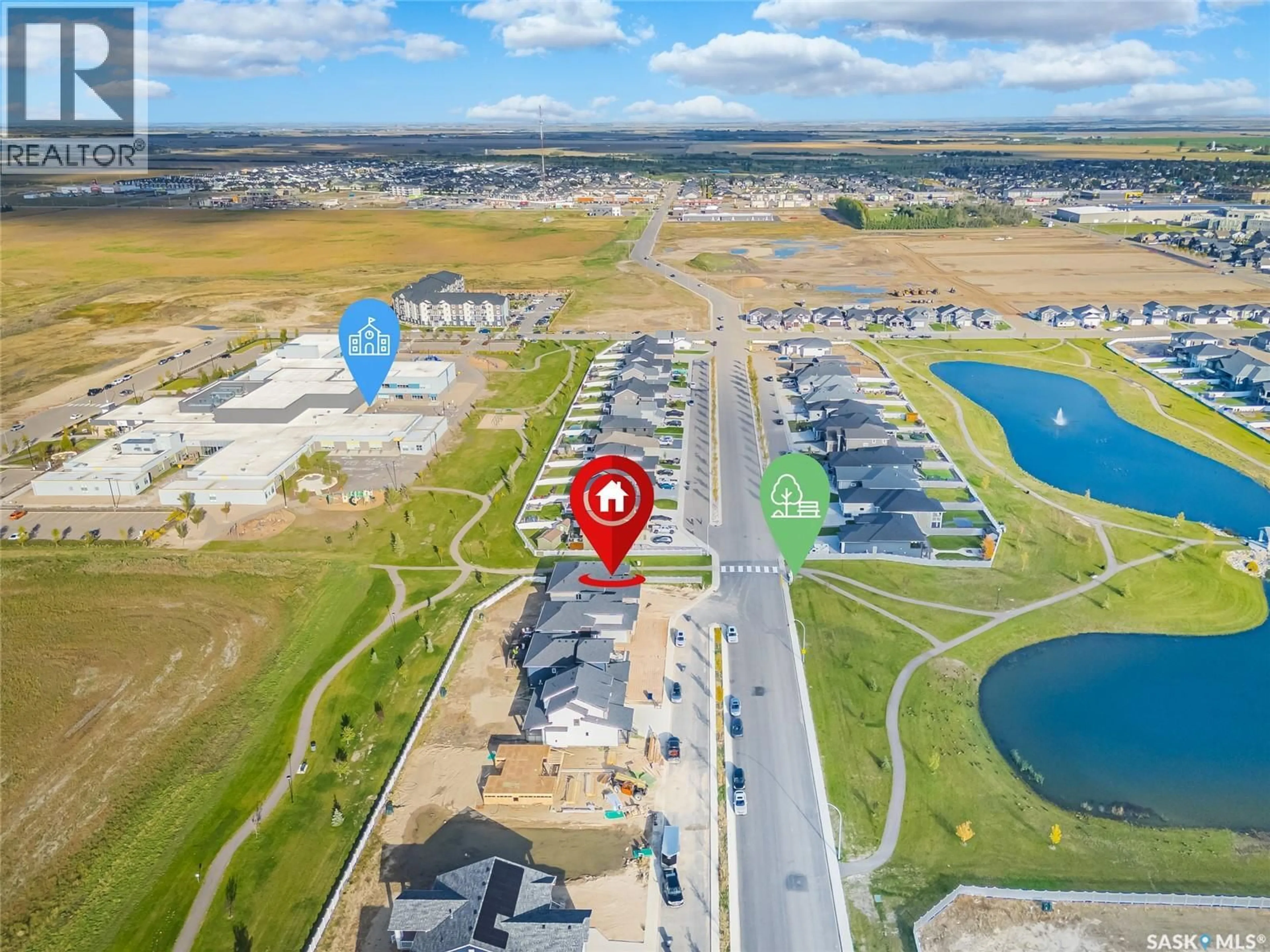 A pic from outside/outdoor area/front of a property/back of a property/a pic from drone, water/lake/river/ocean view for 430 AUGUSTA BOULEVARD, Warman Saskatchewan S0K4S3
