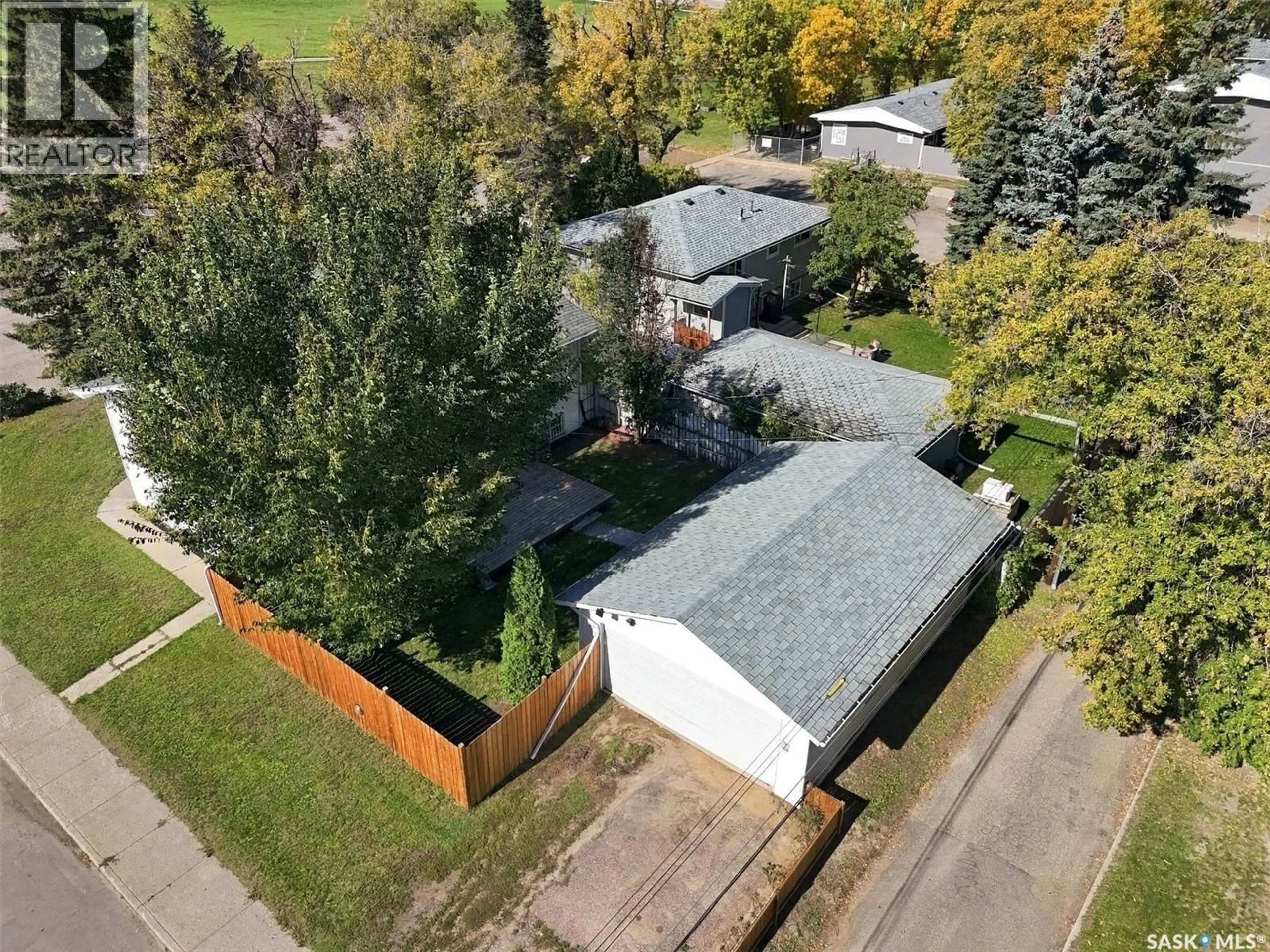 A pic from outside/outdoor area/front of a property/back of a property/a pic from drone, street for 302 MCMILLAN AVENUE, Saskatoon Saskatchewan S7L2T5