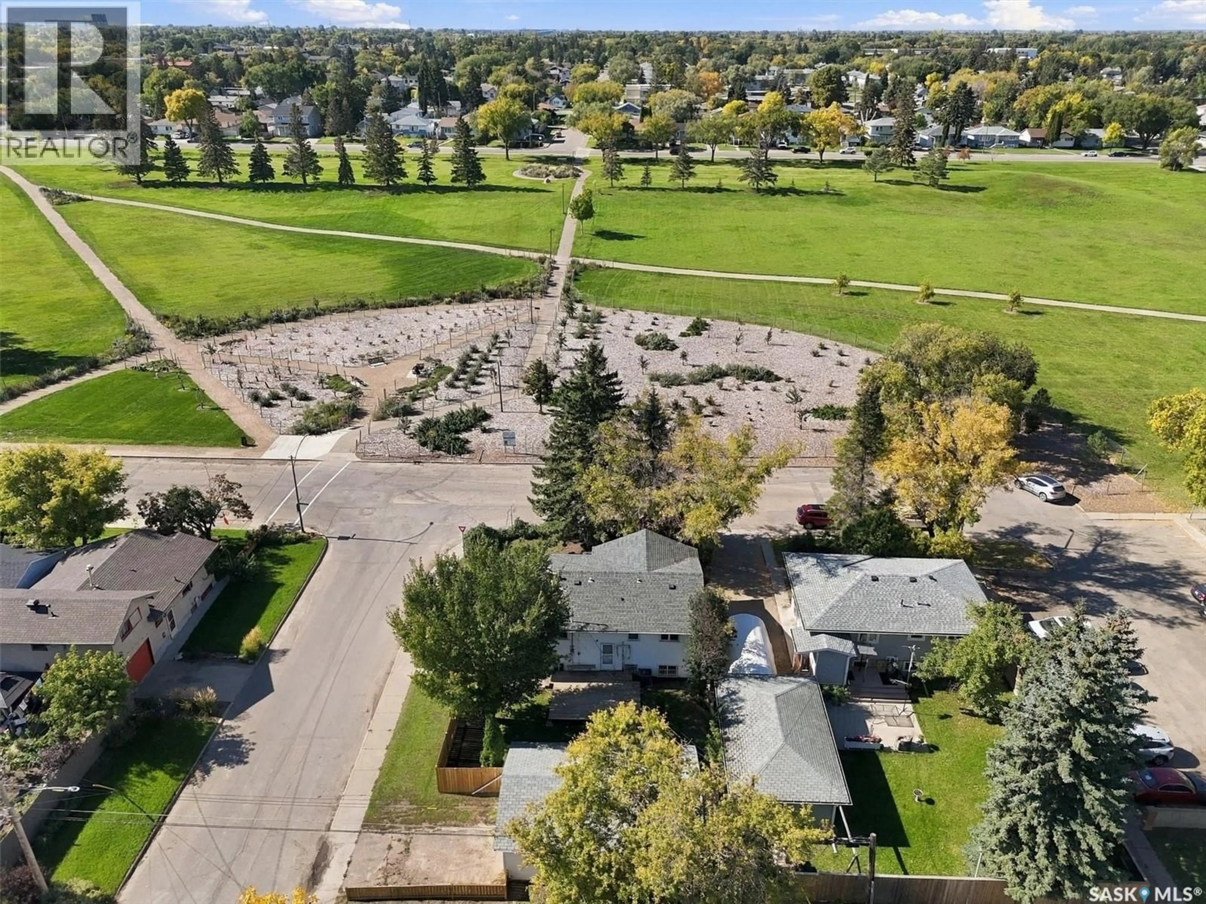 A pic from outside/outdoor area/front of a property/back of a property/a pic from drone, street for 302 MCMILLAN AVENUE, Saskatoon Saskatchewan S7L2T5