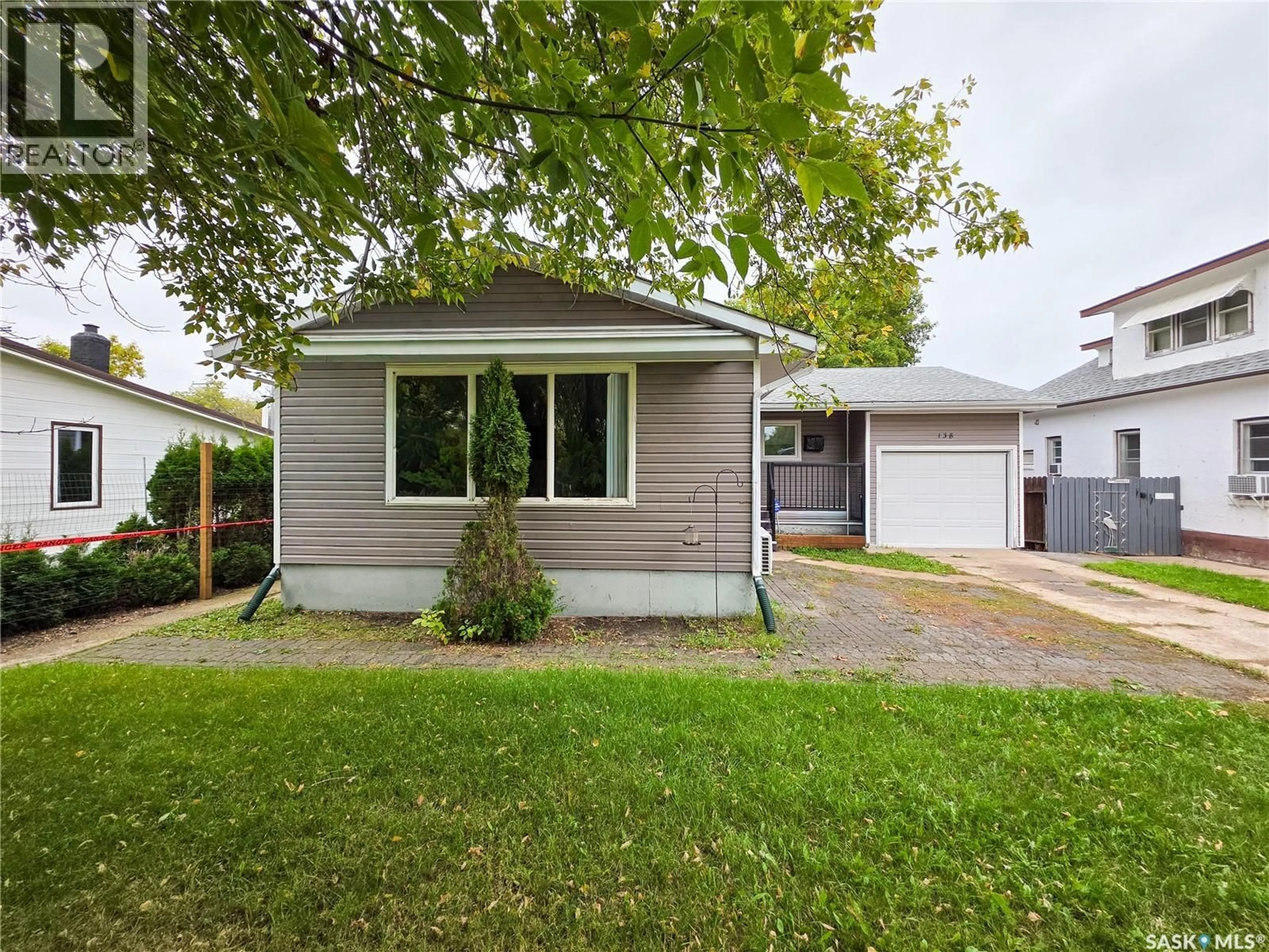 Home with vinyl exterior material, street for 138 6TH AVENUE, Melville Saskatchewan S0A2P0