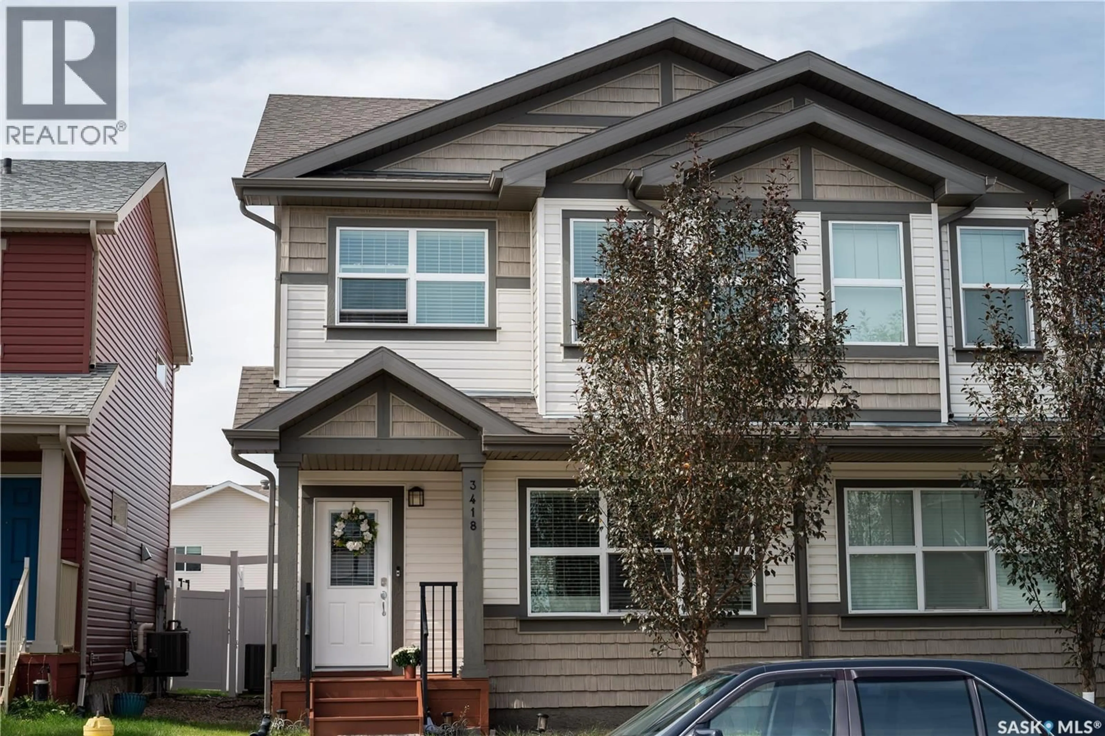 Home with vinyl exterior material, street for 3418 GREEN TURTLE ROAD, Regina Saskatchewan S4V3N7