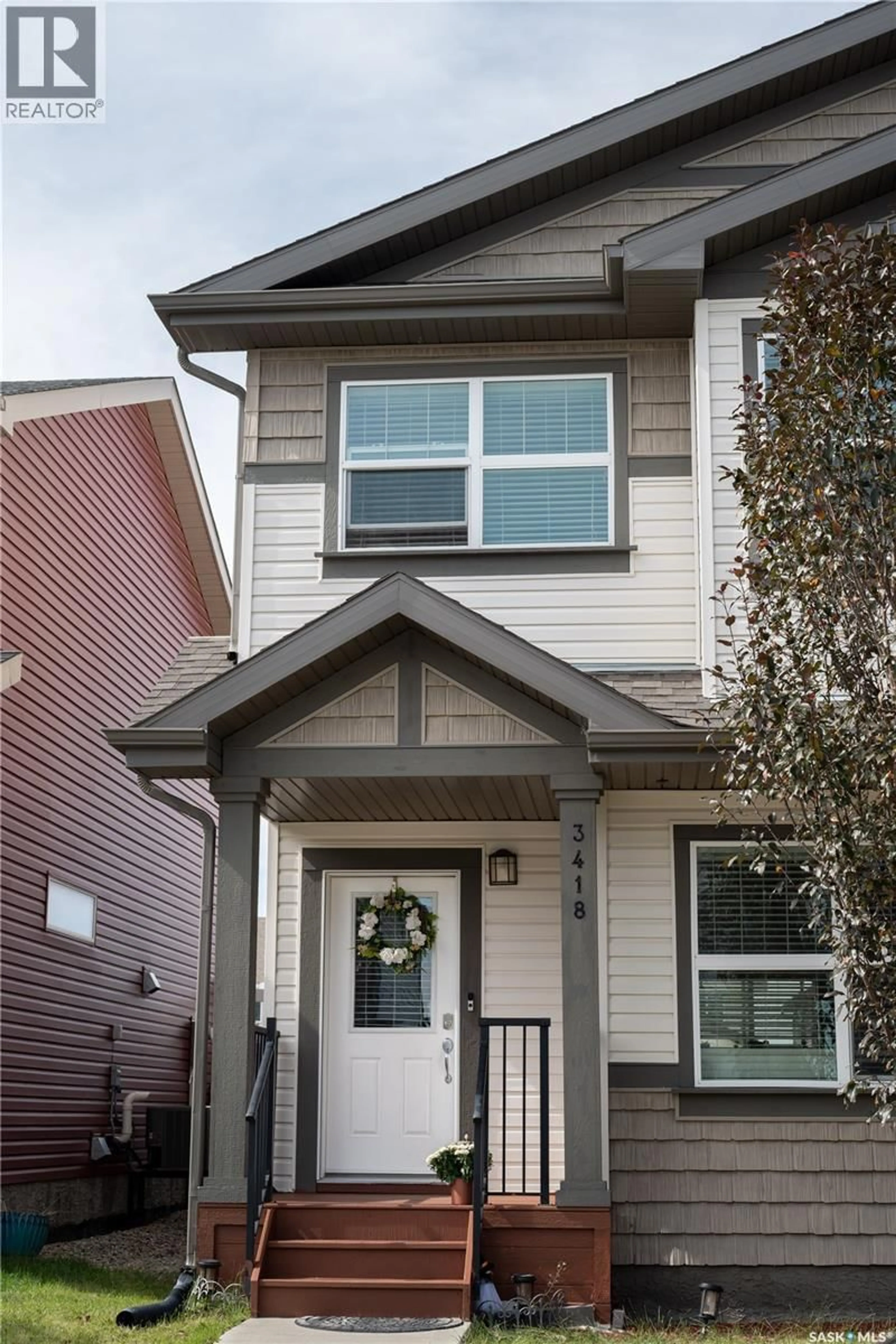 Home with vinyl exterior material, street for 3418 GREEN TURTLE ROAD, Regina Saskatchewan S4V3N7