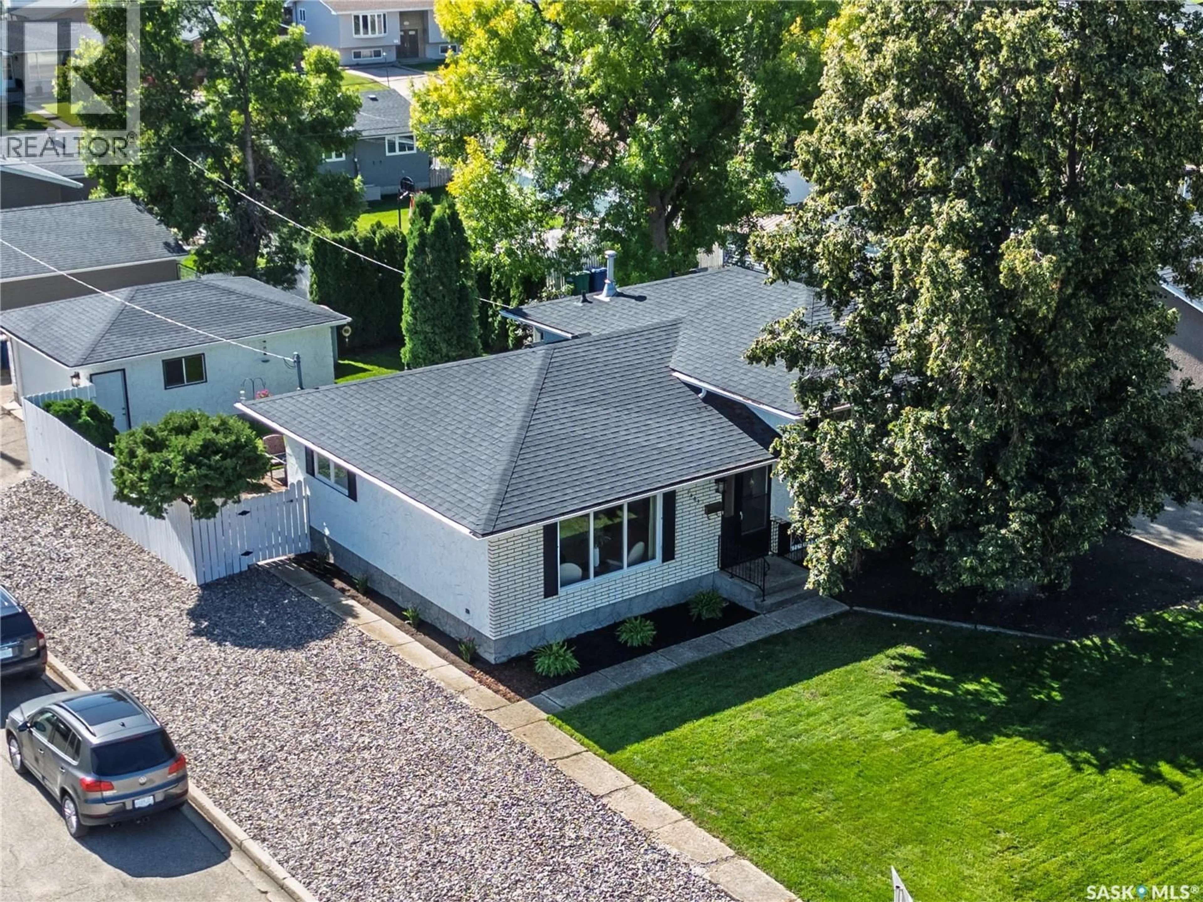 A pic from outside/outdoor area/front of a property/back of a property/a pic from drone, street for 1403 HOCHELAGA STREET, Moose Jaw Saskatchewan S6H6G6