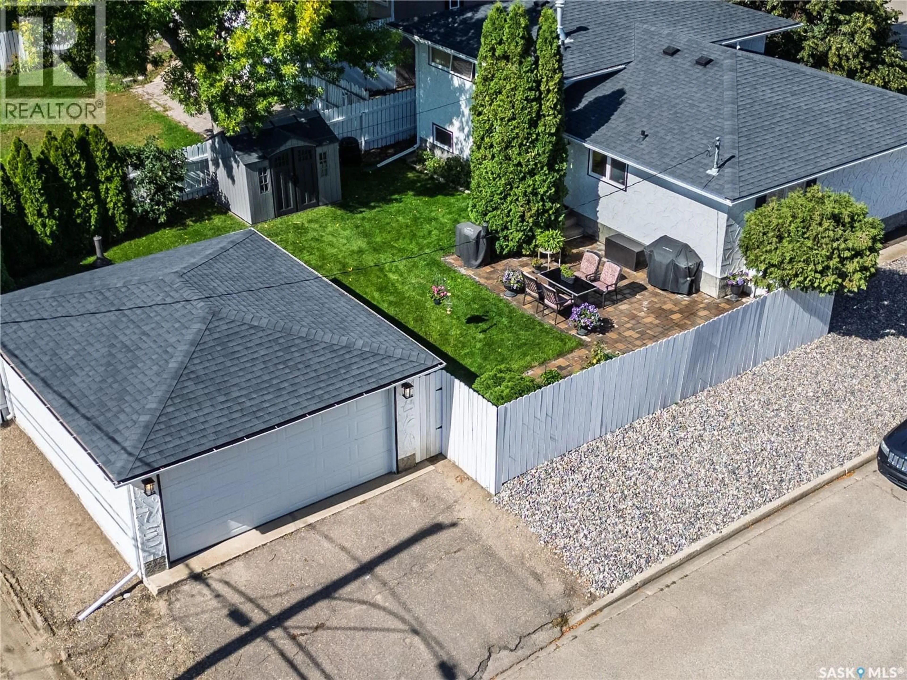 A pic from outside/outdoor area/front of a property/back of a property/a pic from drone, street for 1403 HOCHELAGA STREET, Moose Jaw Saskatchewan S6H6G6