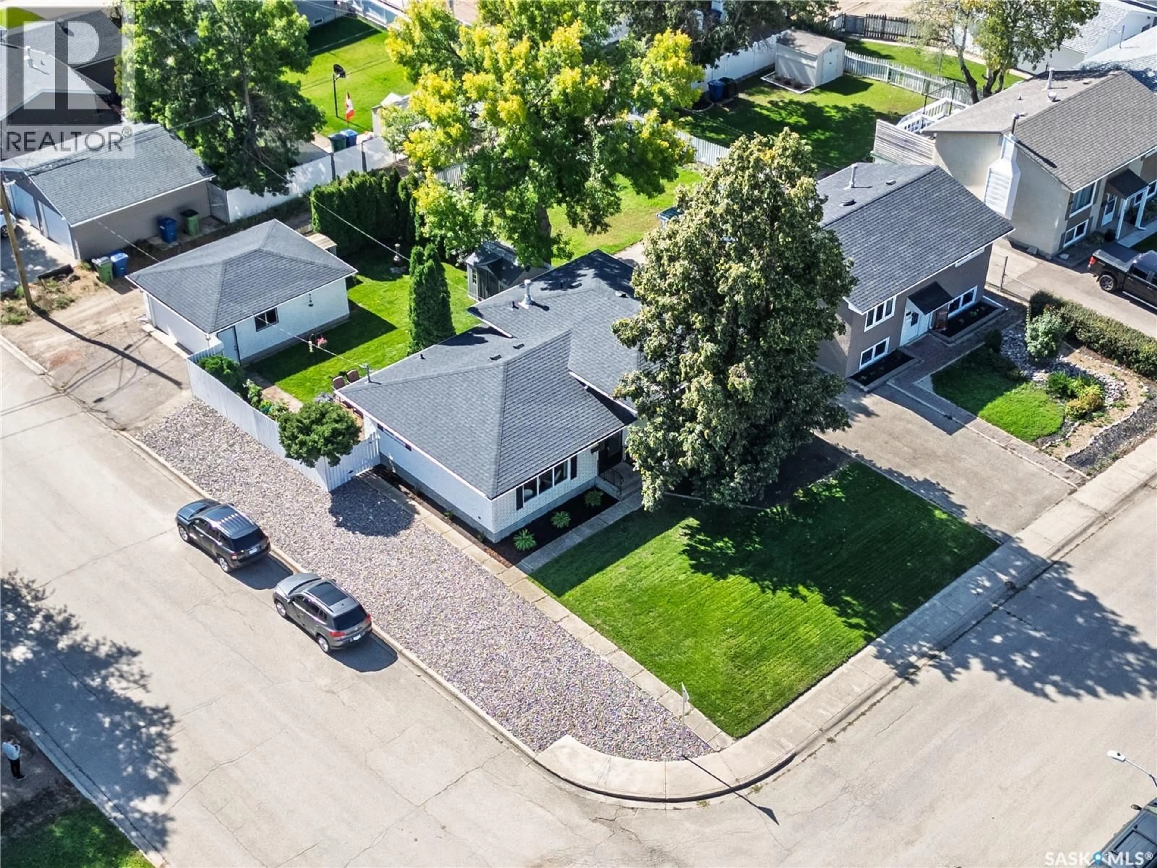 A pic from outside/outdoor area/front of a property/back of a property/a pic from drone, street for 1403 HOCHELAGA STREET, Moose Jaw Saskatchewan S6H6G6