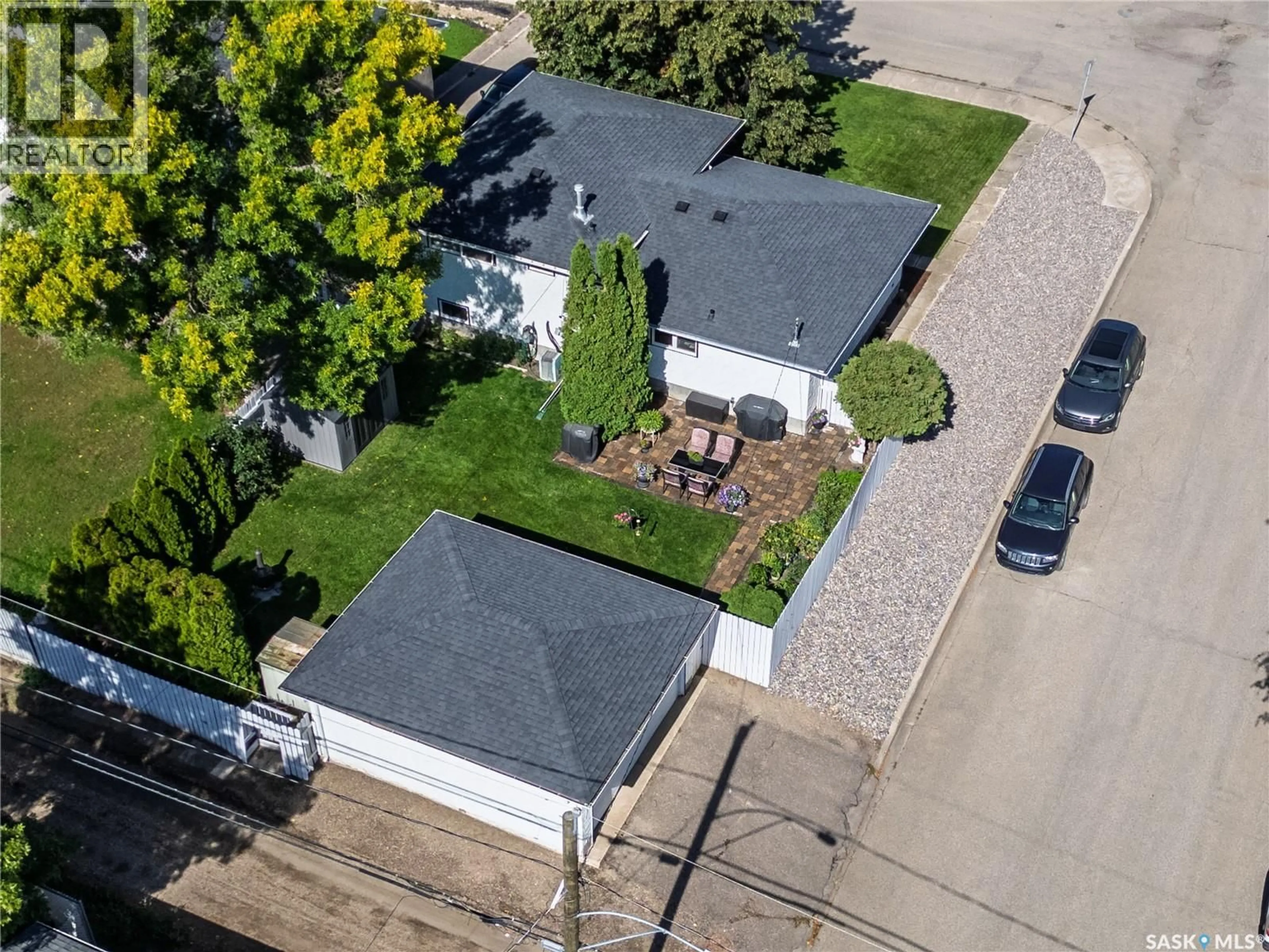 A pic from outside/outdoor area/front of a property/back of a property/a pic from drone, street for 1403 HOCHELAGA STREET, Moose Jaw Saskatchewan S6H6G6