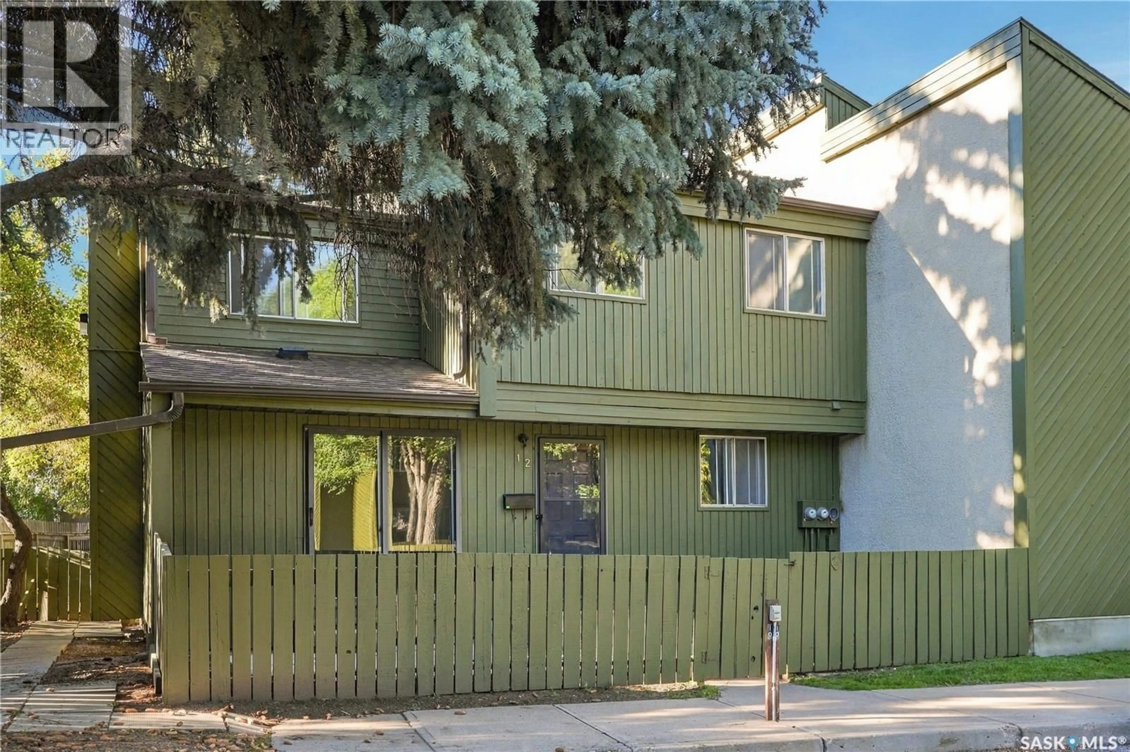 Home with vinyl exterior material, street for 12 215 PRIMROSE DRIVE, Saskatoon Saskatchewan S7K5E4