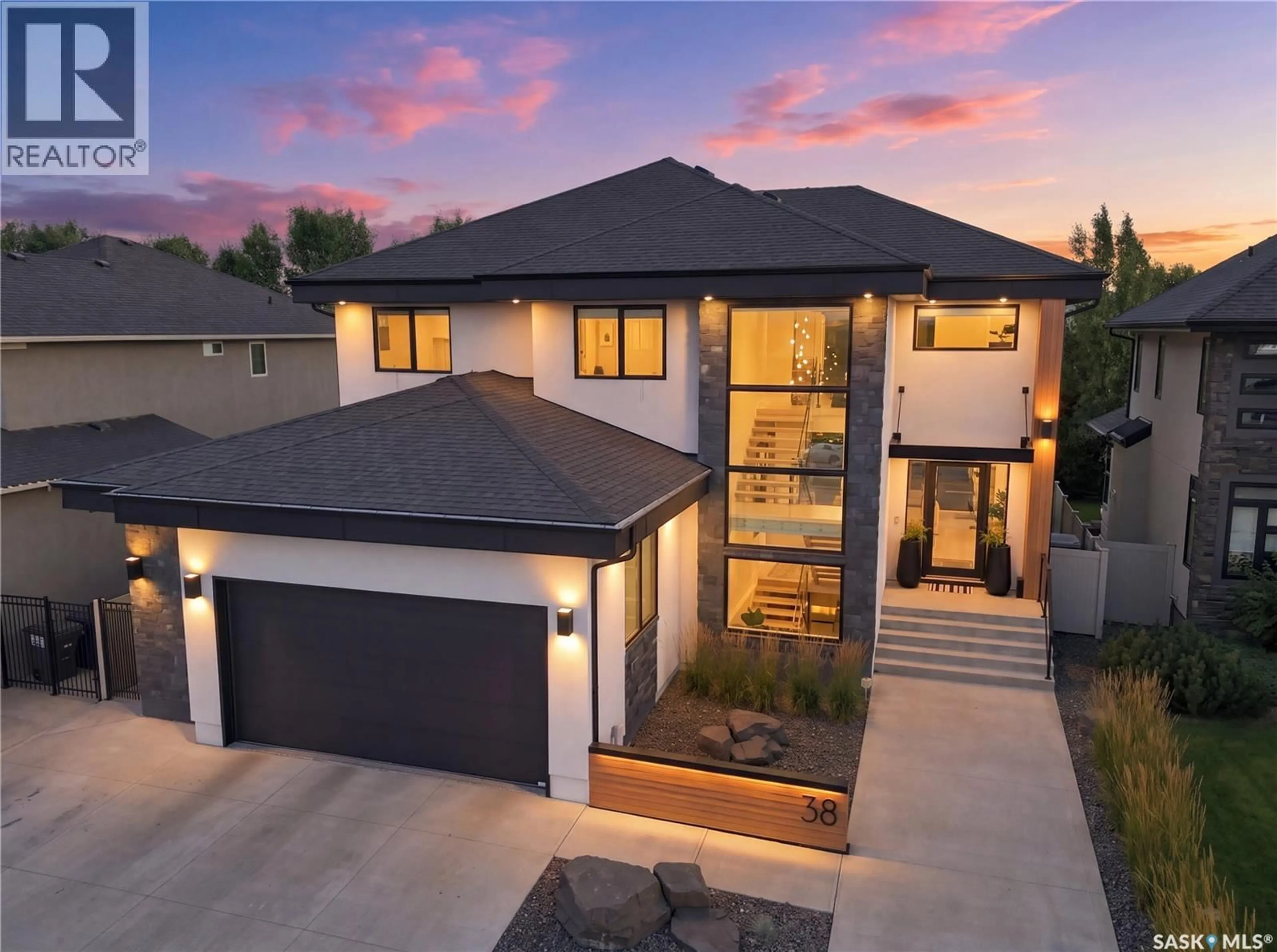 Home with brick exterior material, street for 38 WRIGHT MANOR, Saskatoon Saskatchewan S7N2C9