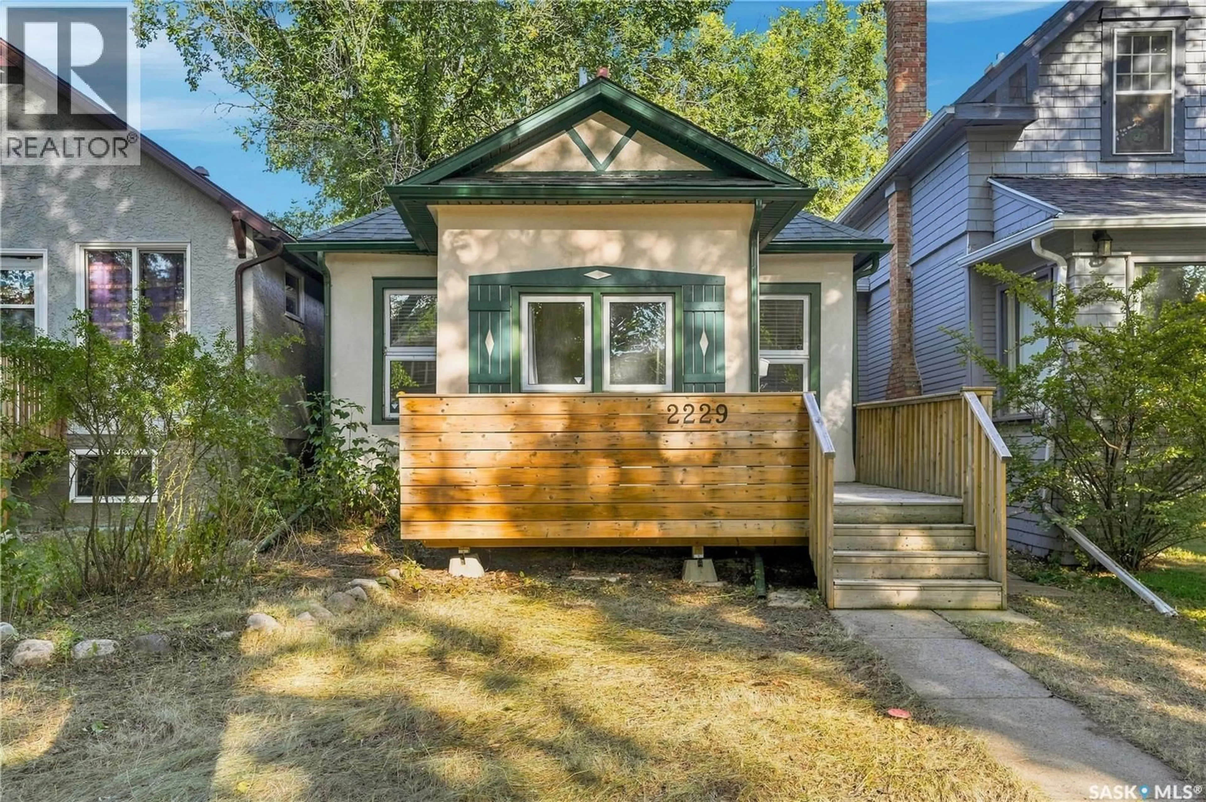 Home with vinyl exterior material, street for 2229 GARNET STREET, Regina Saskatchewan S4T3A1