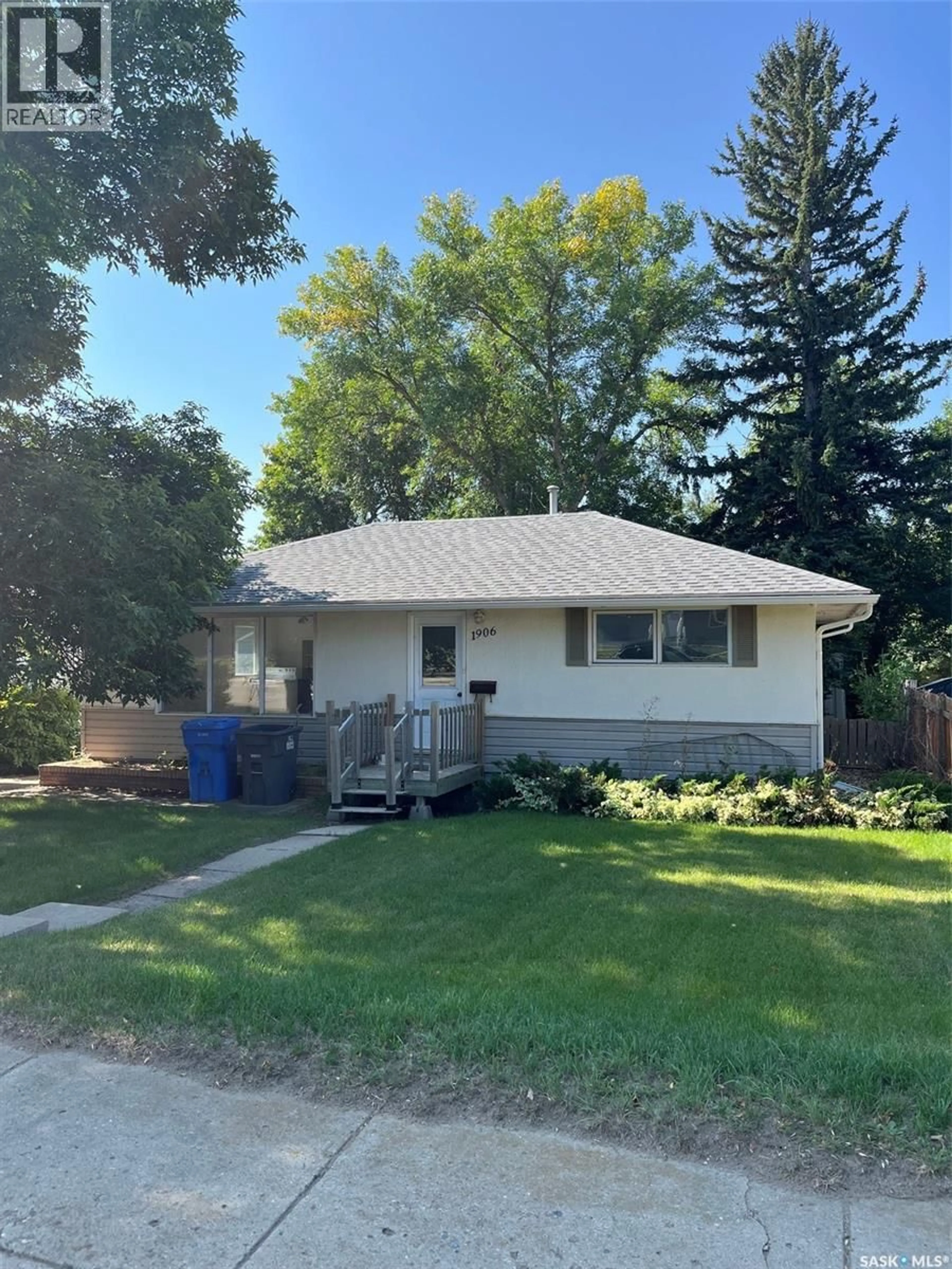 Home with vinyl exterior material, street for 1906 FIRST STREET, Estevan Saskatchewan S4A0H8