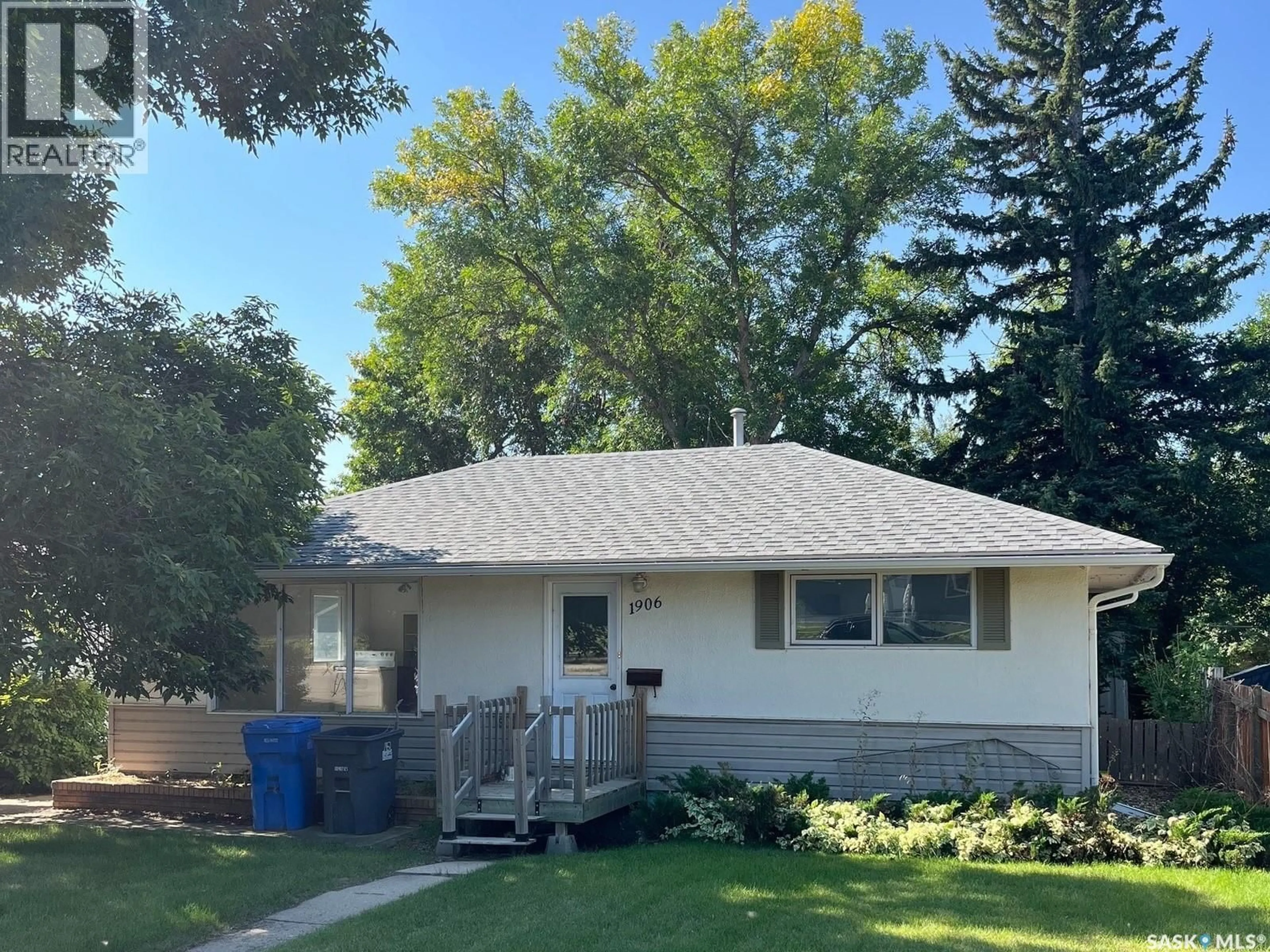 Home with vinyl exterior material, street for 1906 FIRST STREET, Estevan Saskatchewan S4A0H8