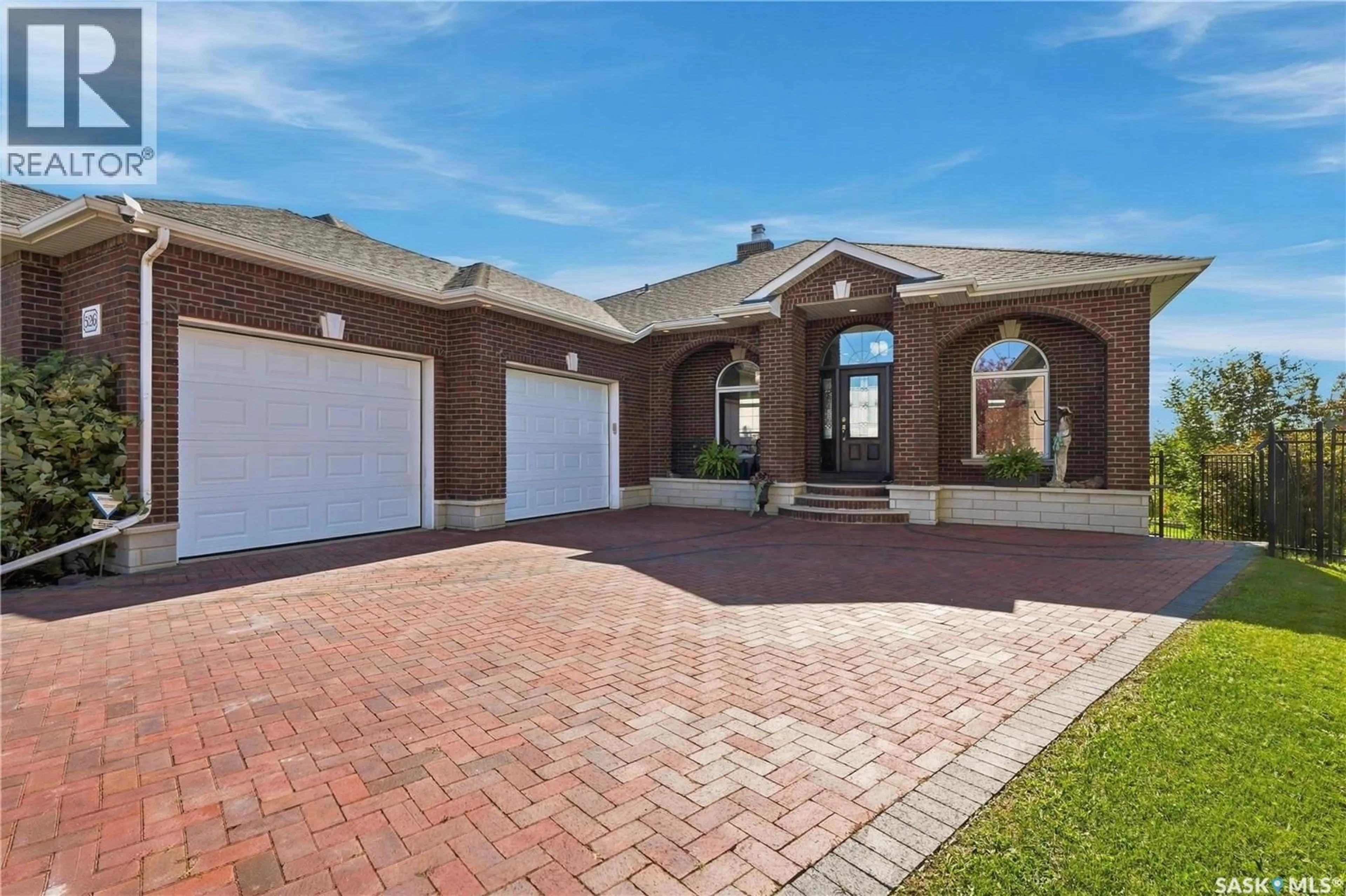 Home with brick exterior material, street for 526 HARTLEY TERRACE, Saskatoon Saskatchewan S7T0E6