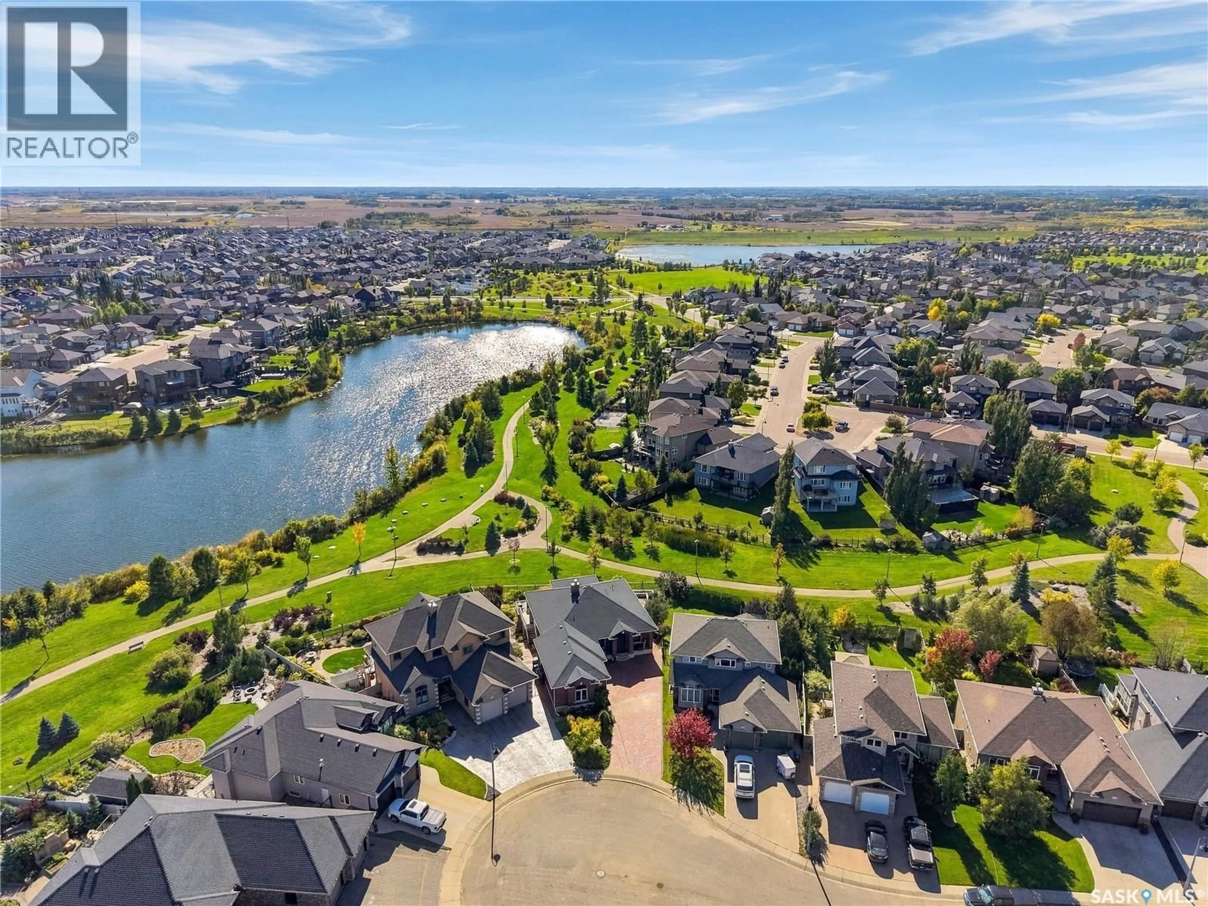 A pic from outside/outdoor area/front of a property/back of a property/a pic from drone, water/lake/river/ocean view for 526 HARTLEY TERRACE, Saskatoon Saskatchewan S7T0E6