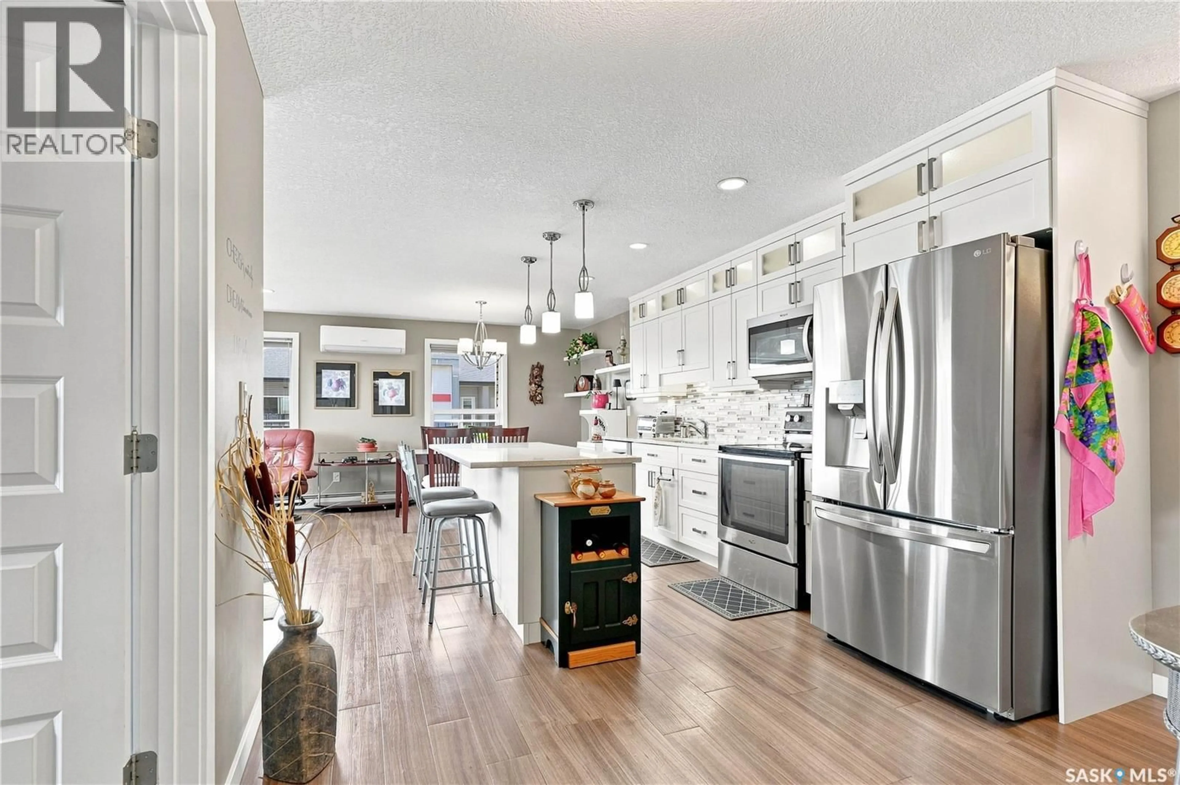 Open concept kitchen, ceramic/tile floor for 407 135 BEAUDRY CRESCENT, Martensville Saskatchewan S0K2T1