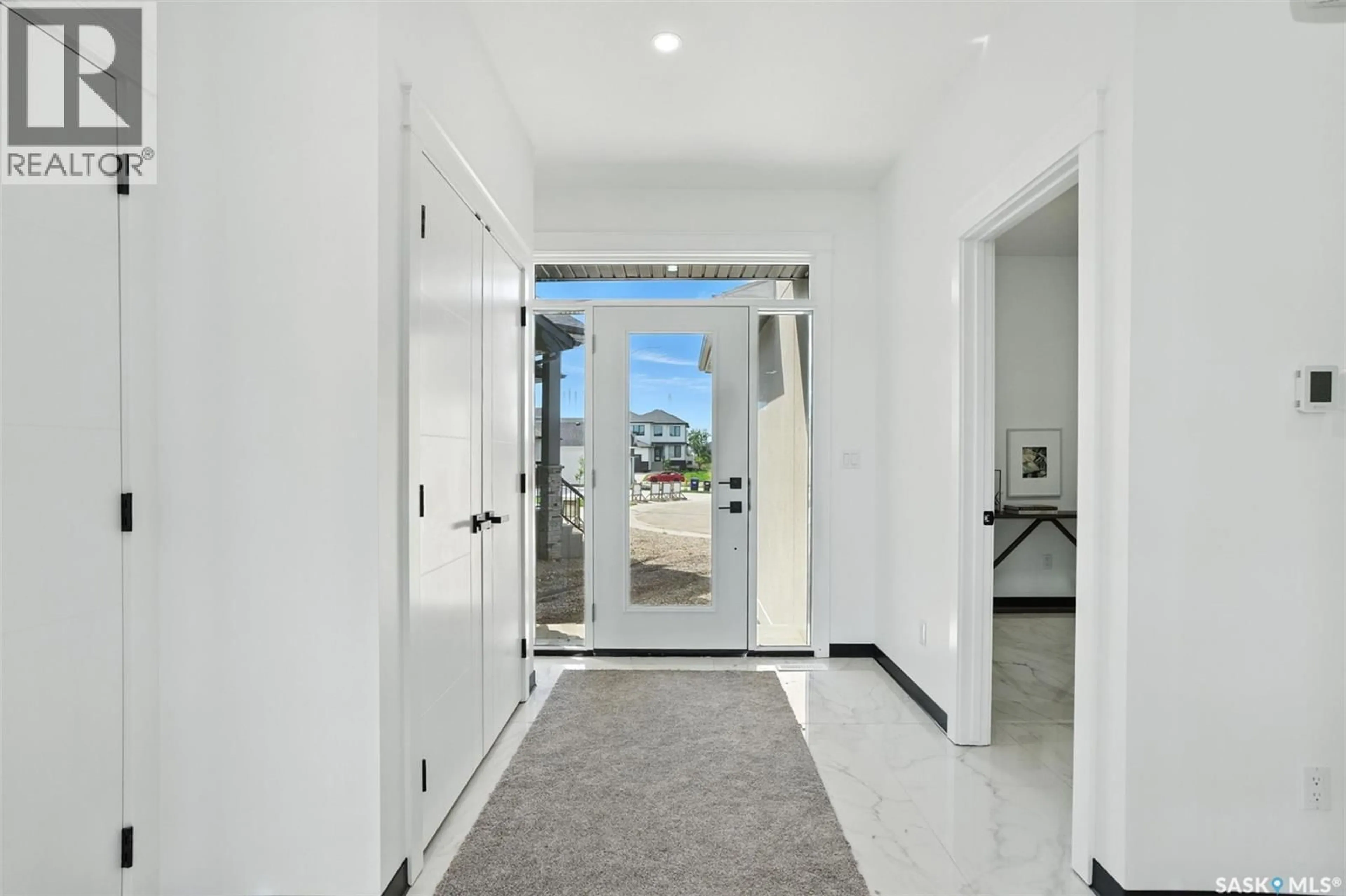 Indoor foyer for 319 WOOLF BAY, Saskatoon Saskatchewan S7W1E5