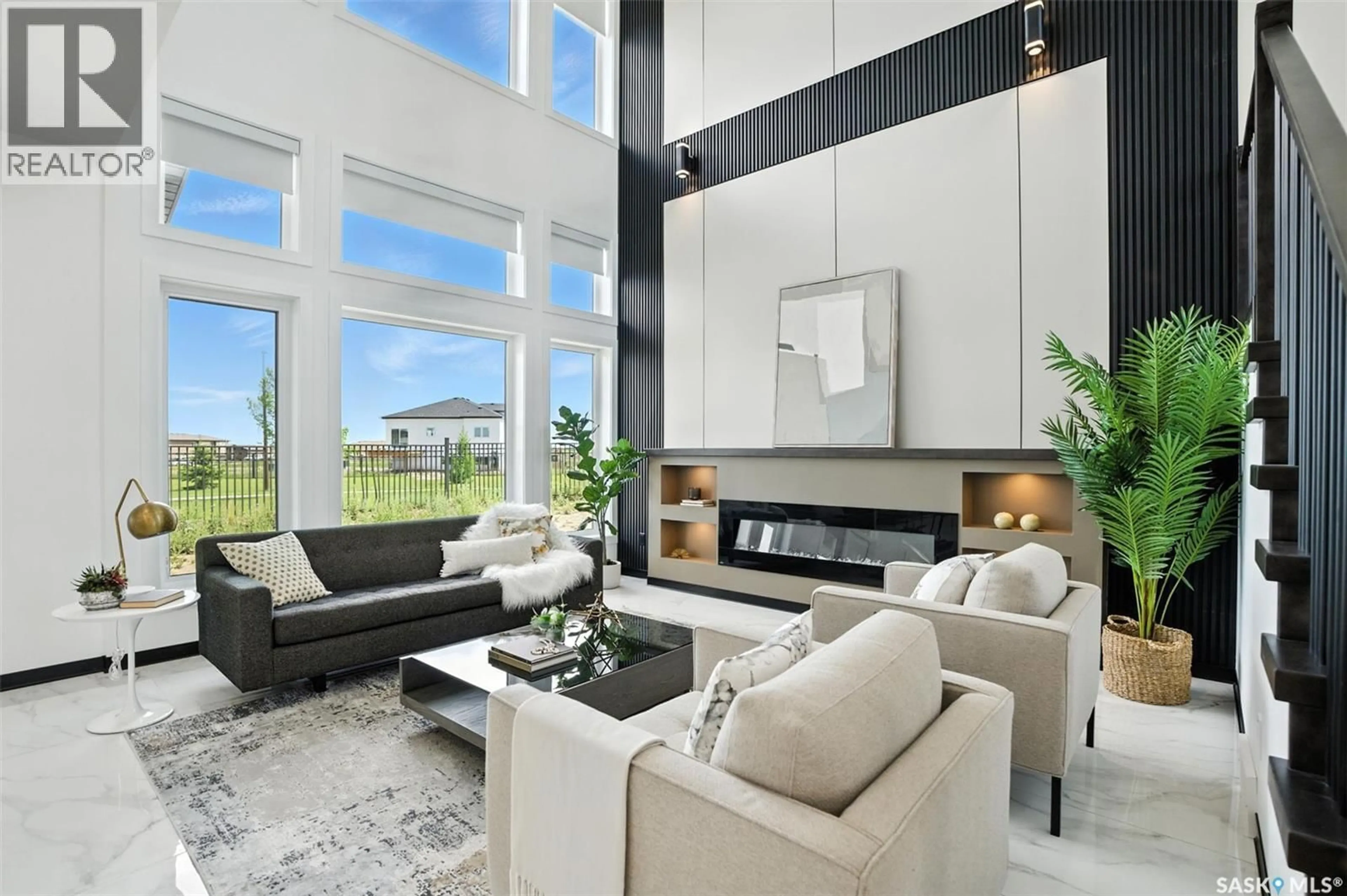 Living room with furniture, unknown for 319 WOOLF BAY, Saskatoon Saskatchewan S7W1E5