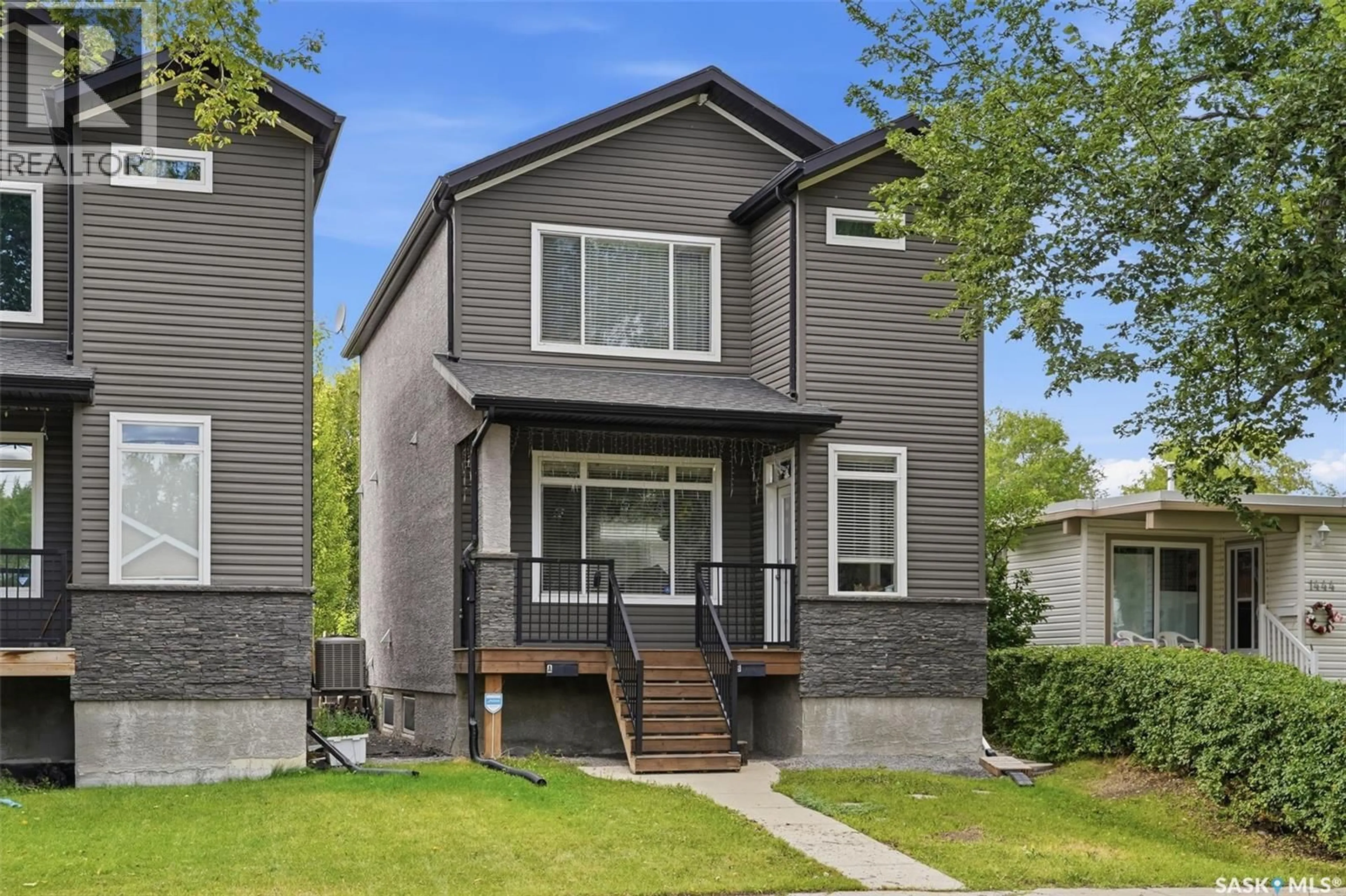 Home with vinyl exterior material, street for 1448 MCINTOSH STREET, Regina Saskatchewan S4T5C3