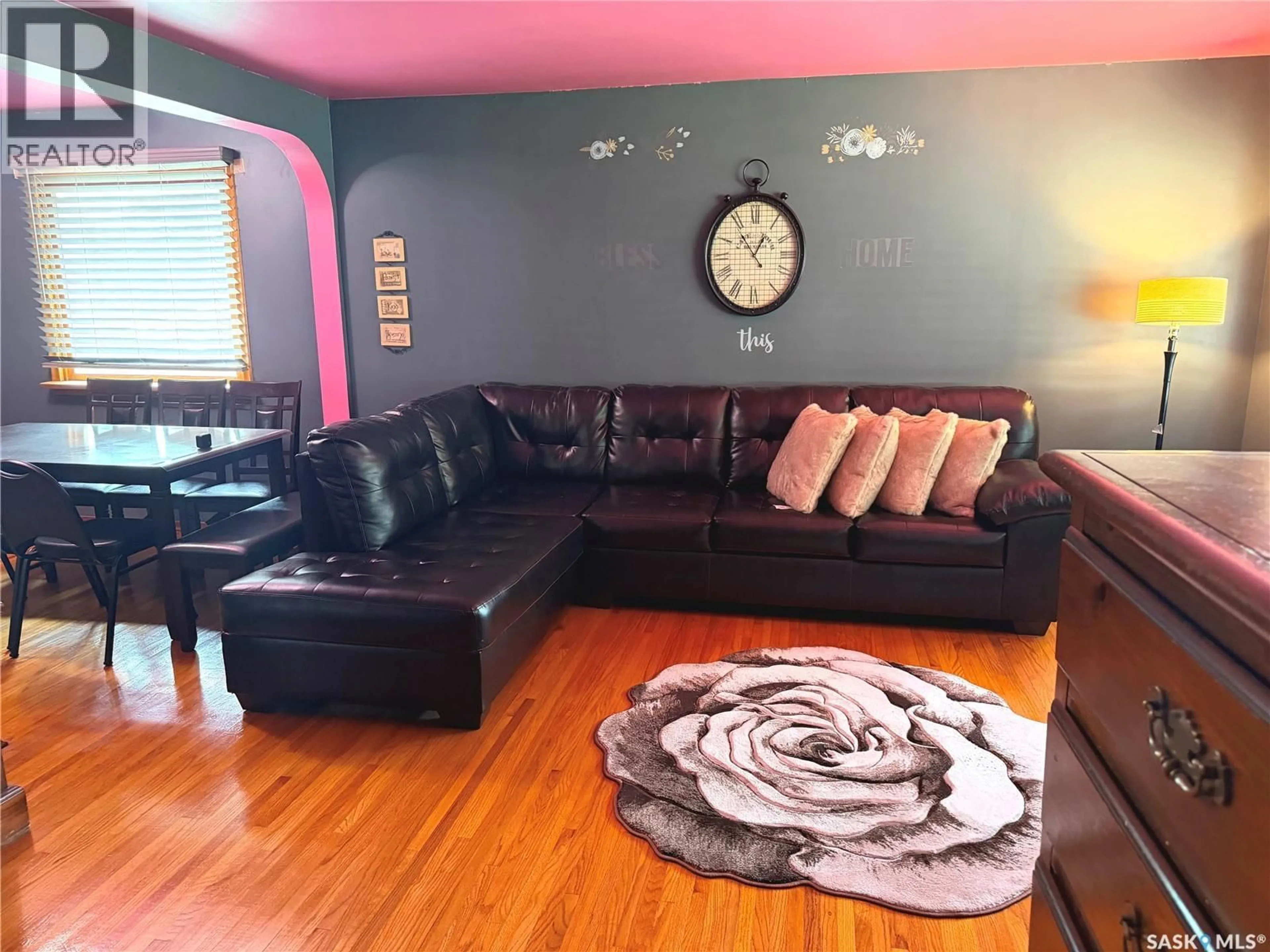 Living room with furniture, wood/laminate floor for 485 BAY AVENUE, Fort Qu'Appelle Saskatchewan S0G1S0