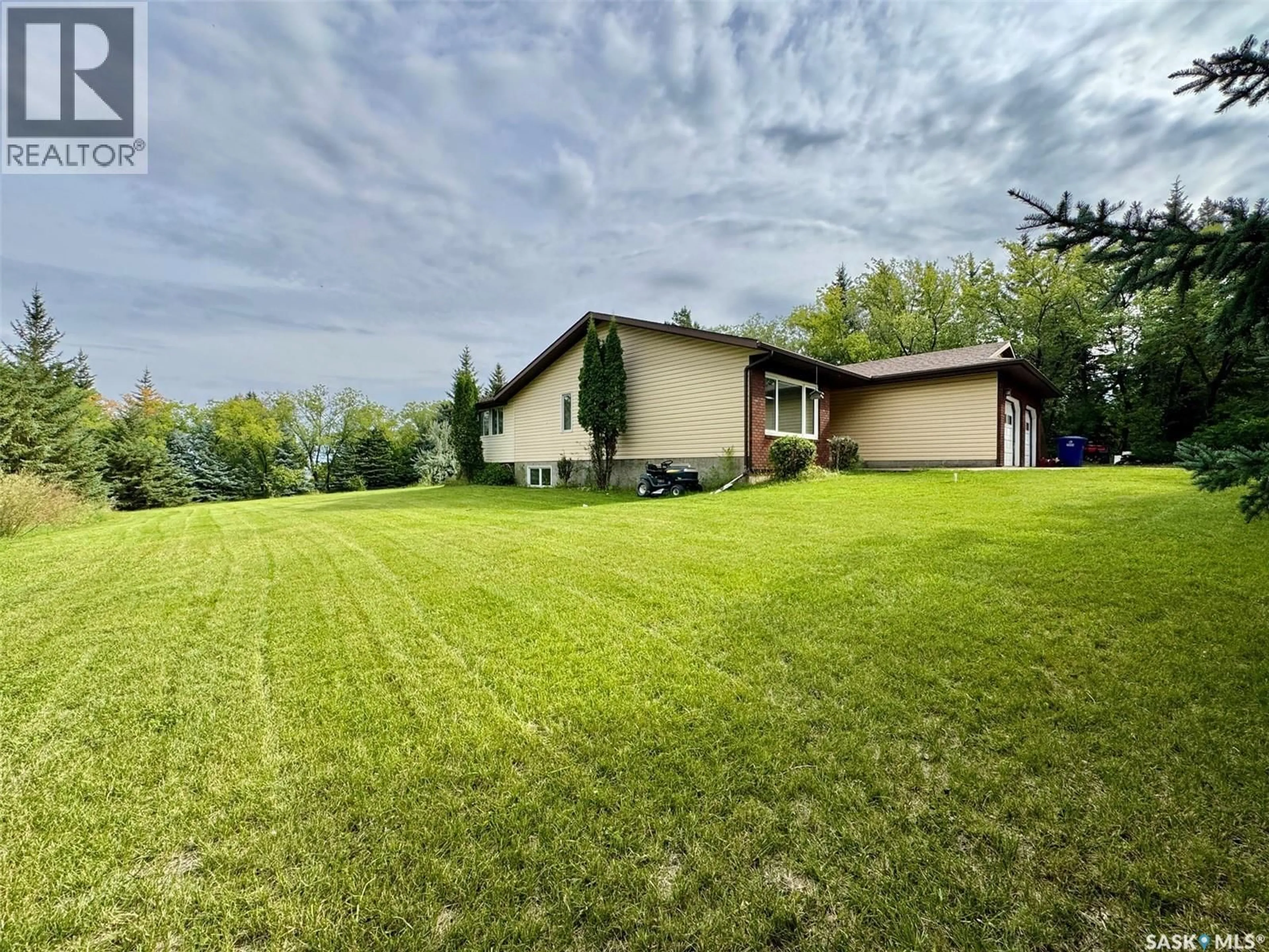 A pic from outside/outdoor area/front of a property/back of a property/a pic from drone, water/lake/river/ocean view for #3 WEST PARK DRIVE, Battleford Saskatchewan S0M0E0