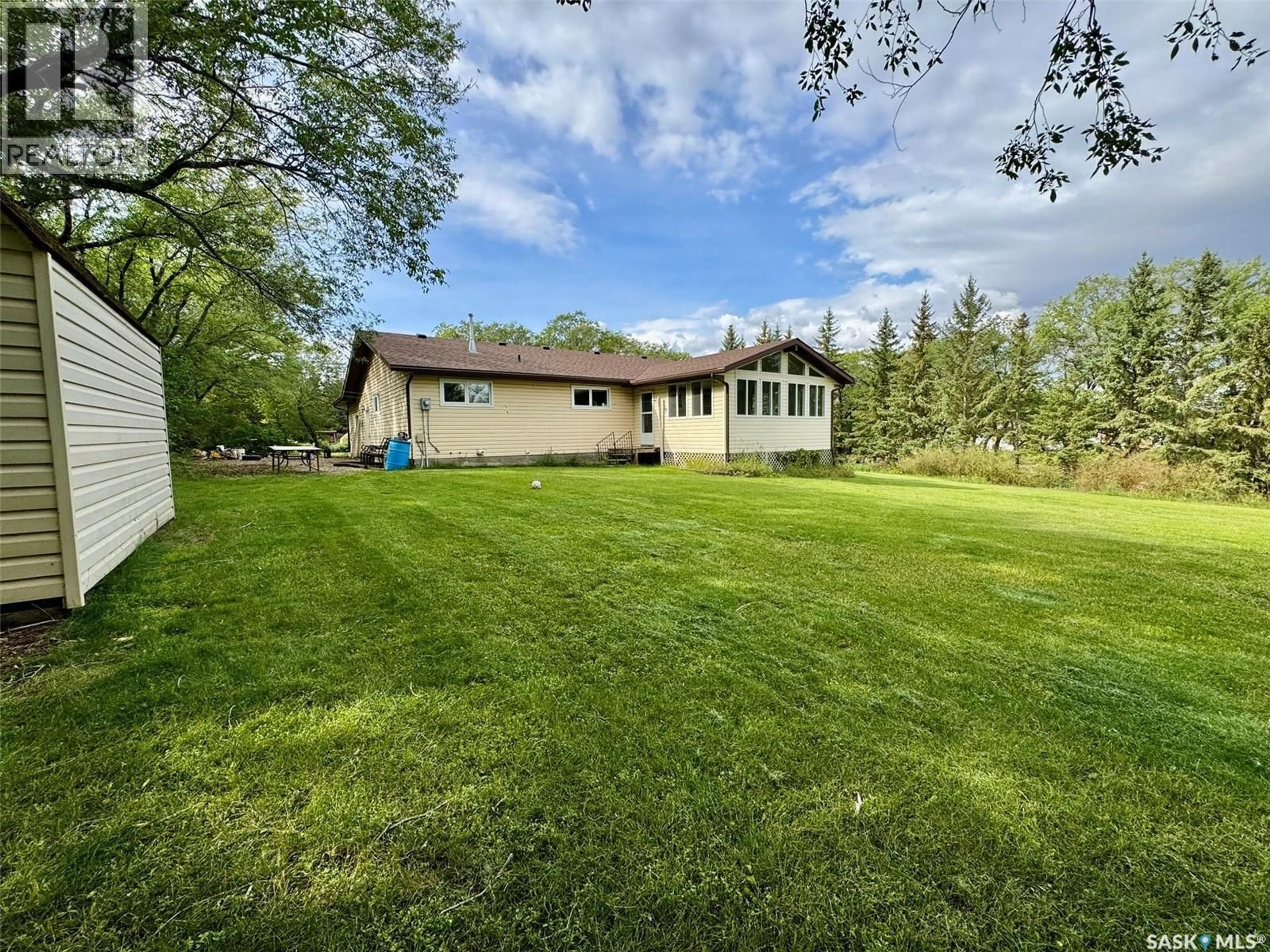 A pic from outside/outdoor area/front of a property/back of a property/a pic from drone, water/lake/river/ocean view for #3 WEST PARK DRIVE, Battleford Saskatchewan S0M0E0
