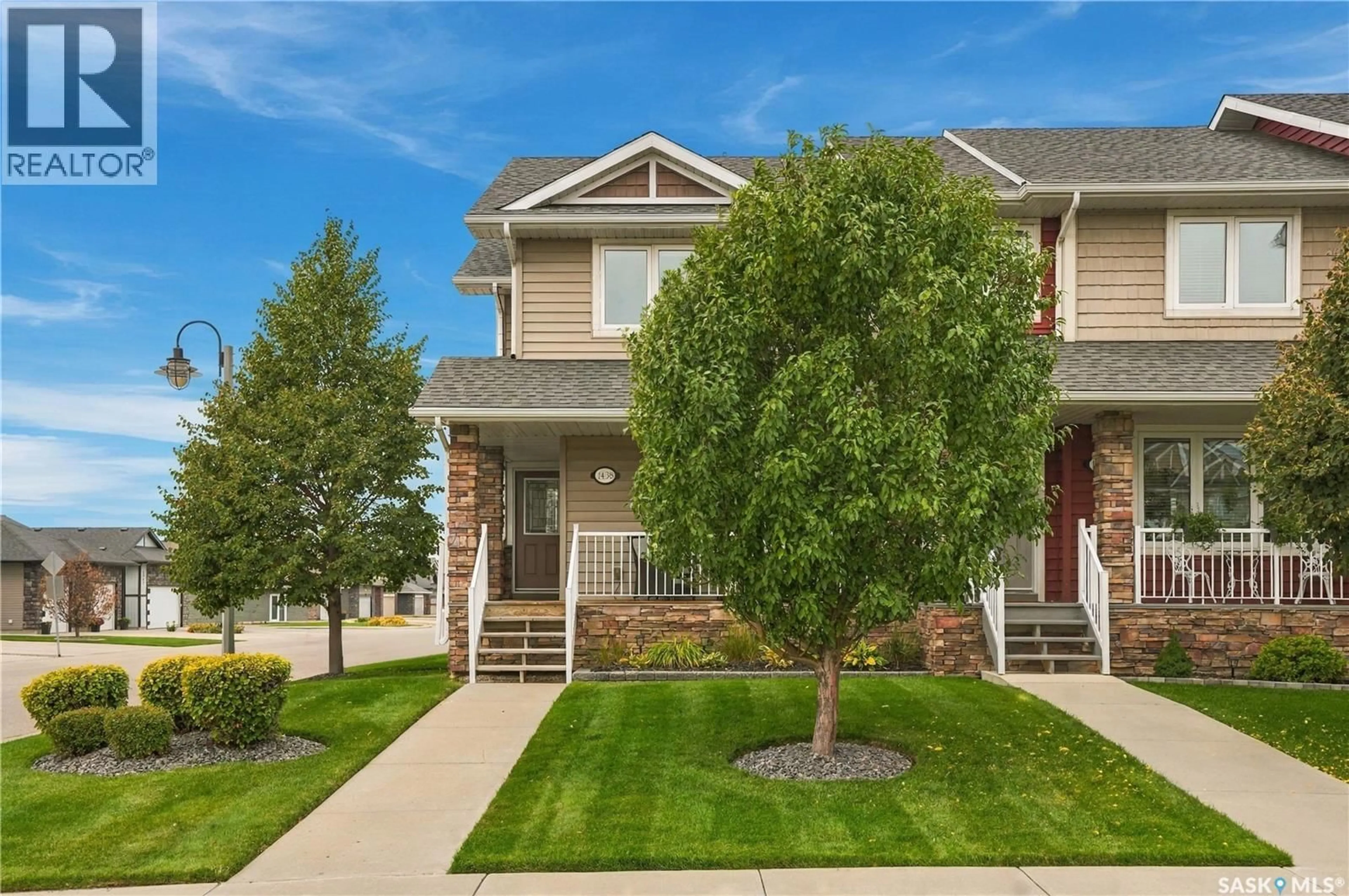 Home with vinyl exterior material, street for 1438 HUNTER ROAD, Saskatoon Saskatchewan S7T0T4