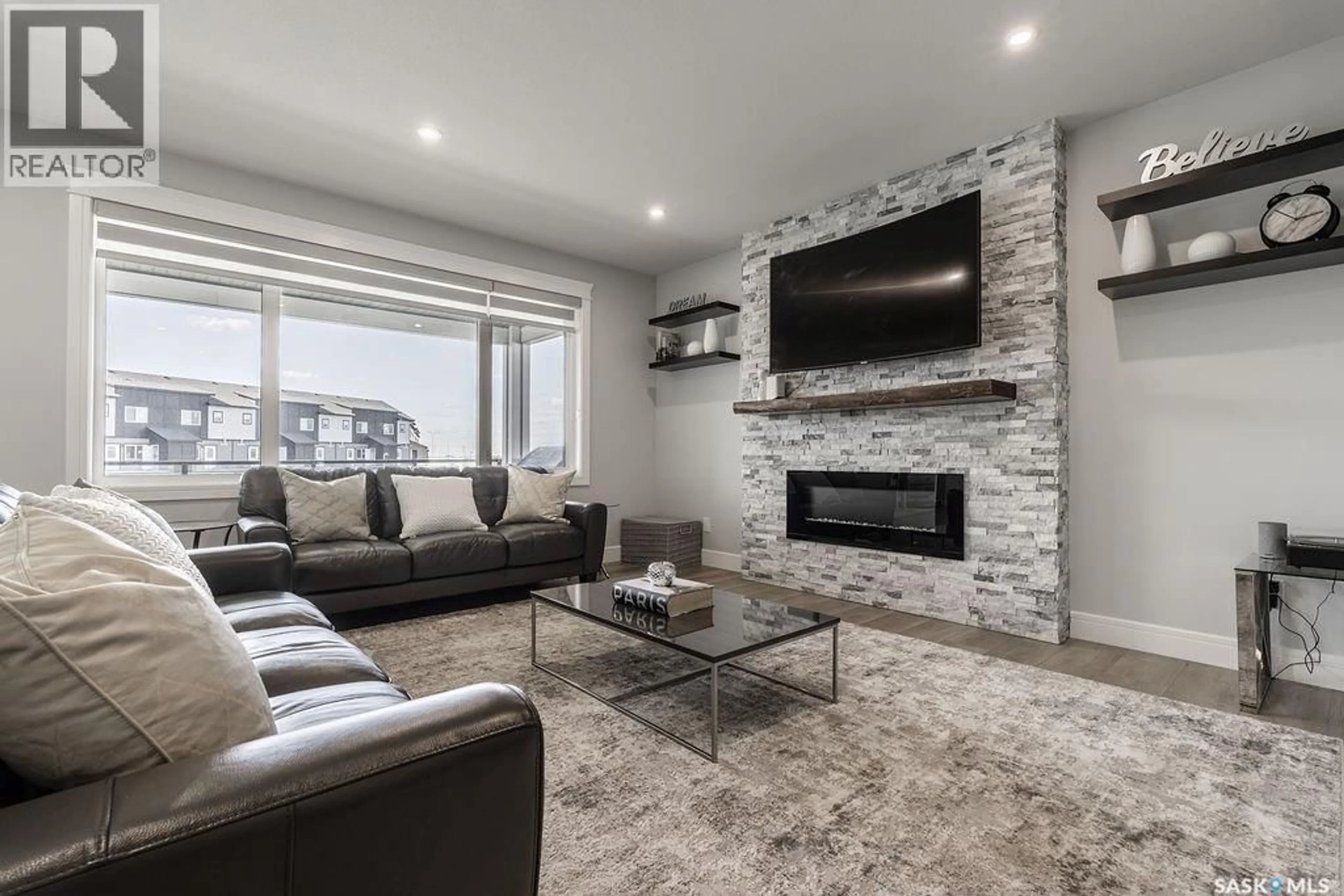 Living room with furniture, unknown for 411 SHARMA CRESCENT, Saskatoon Saskatchewan S7W0Y4