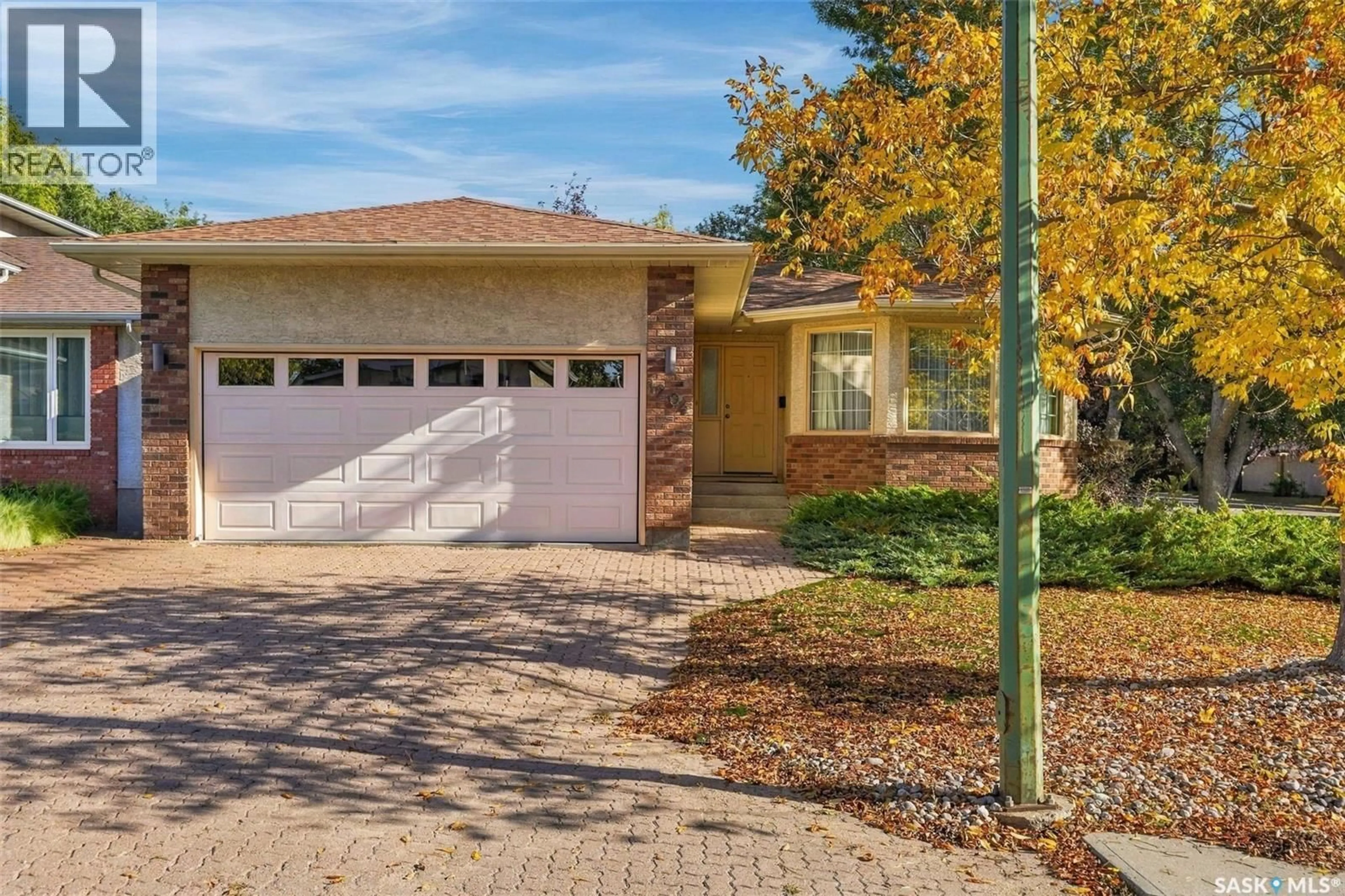 Home with brick exterior material, street for 1204 LAPCHUK CRESCENT, Regina Saskatchewan S4X4K5