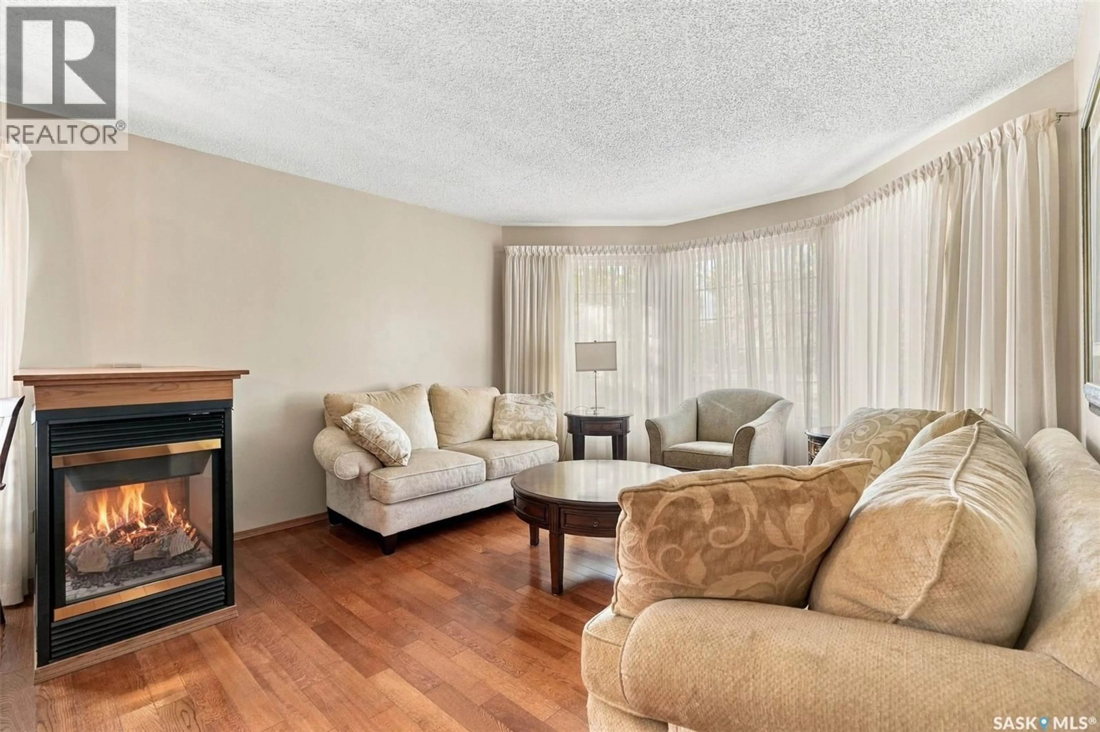Living room with furniture, unknown for 1204 LAPCHUK CRESCENT, Regina Saskatchewan S4X4K5