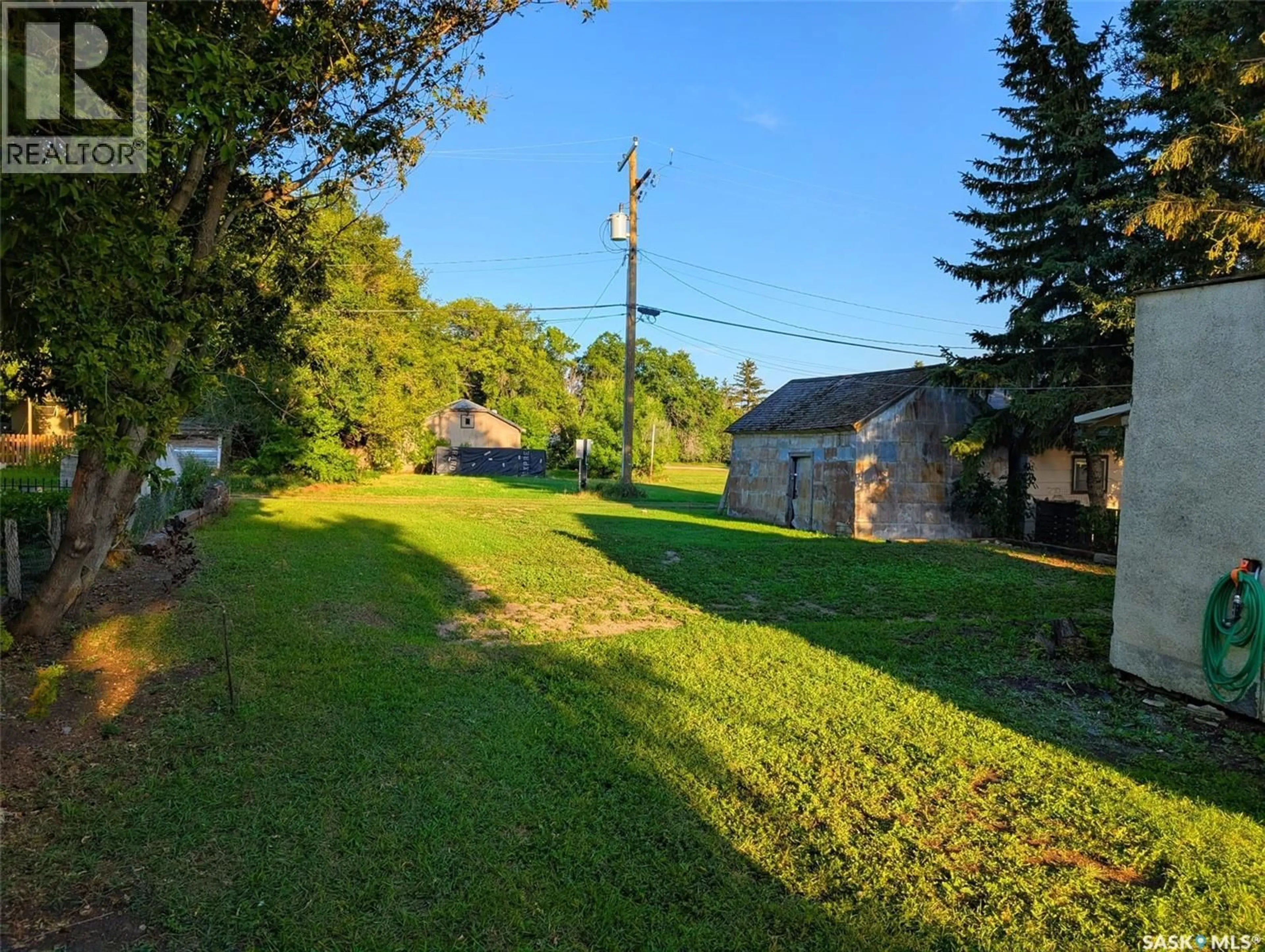 A pic from outside/outdoor area/front of a property/back of a property/a pic from drone, street for 46 GOVERNMENT ROAD, Prud'homme Saskatchewan S0K3K0