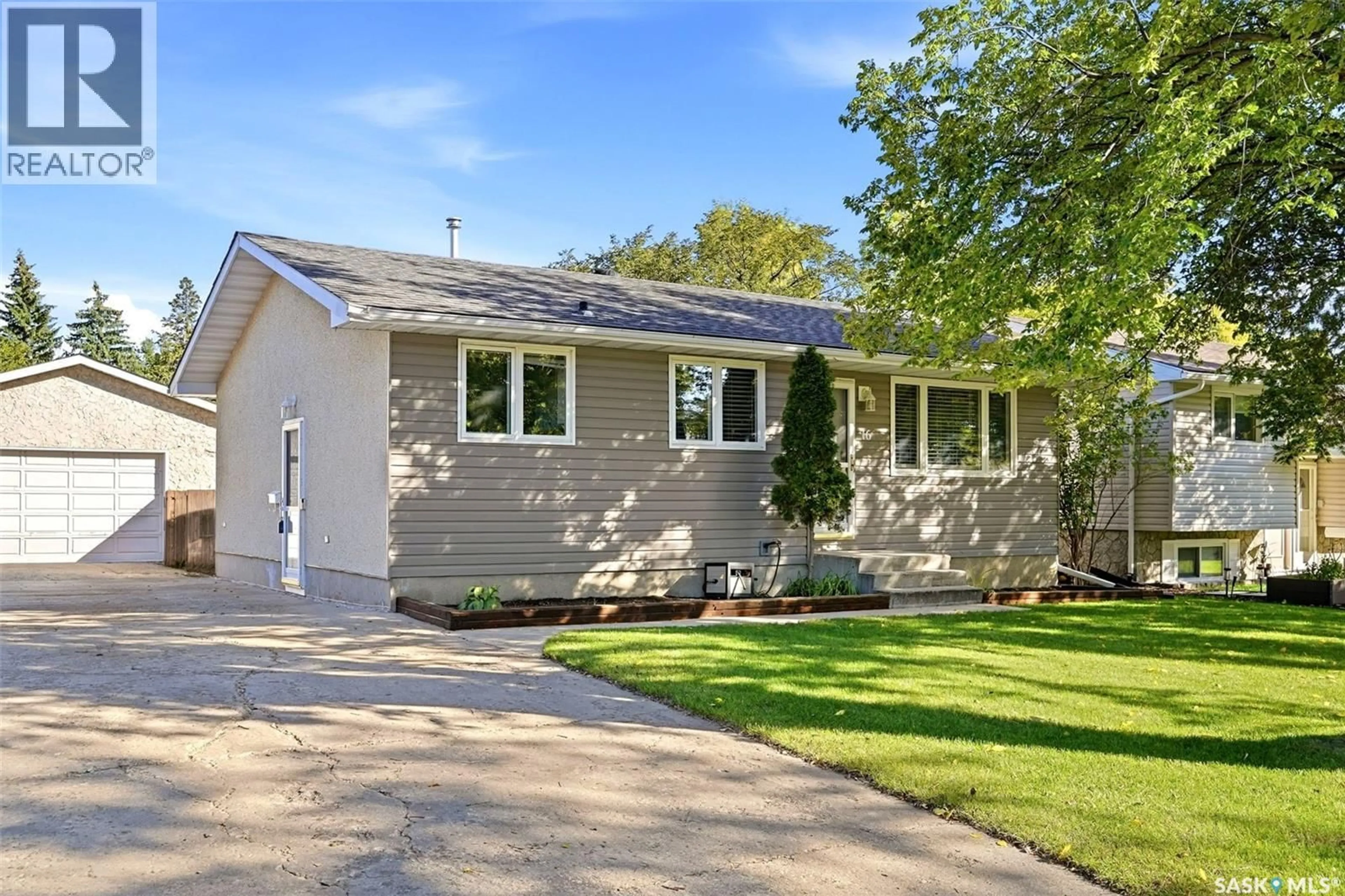 Home with vinyl exterior material, street for 16 SANDISON CRESCENT, Regina Saskatchewan S4R6R9