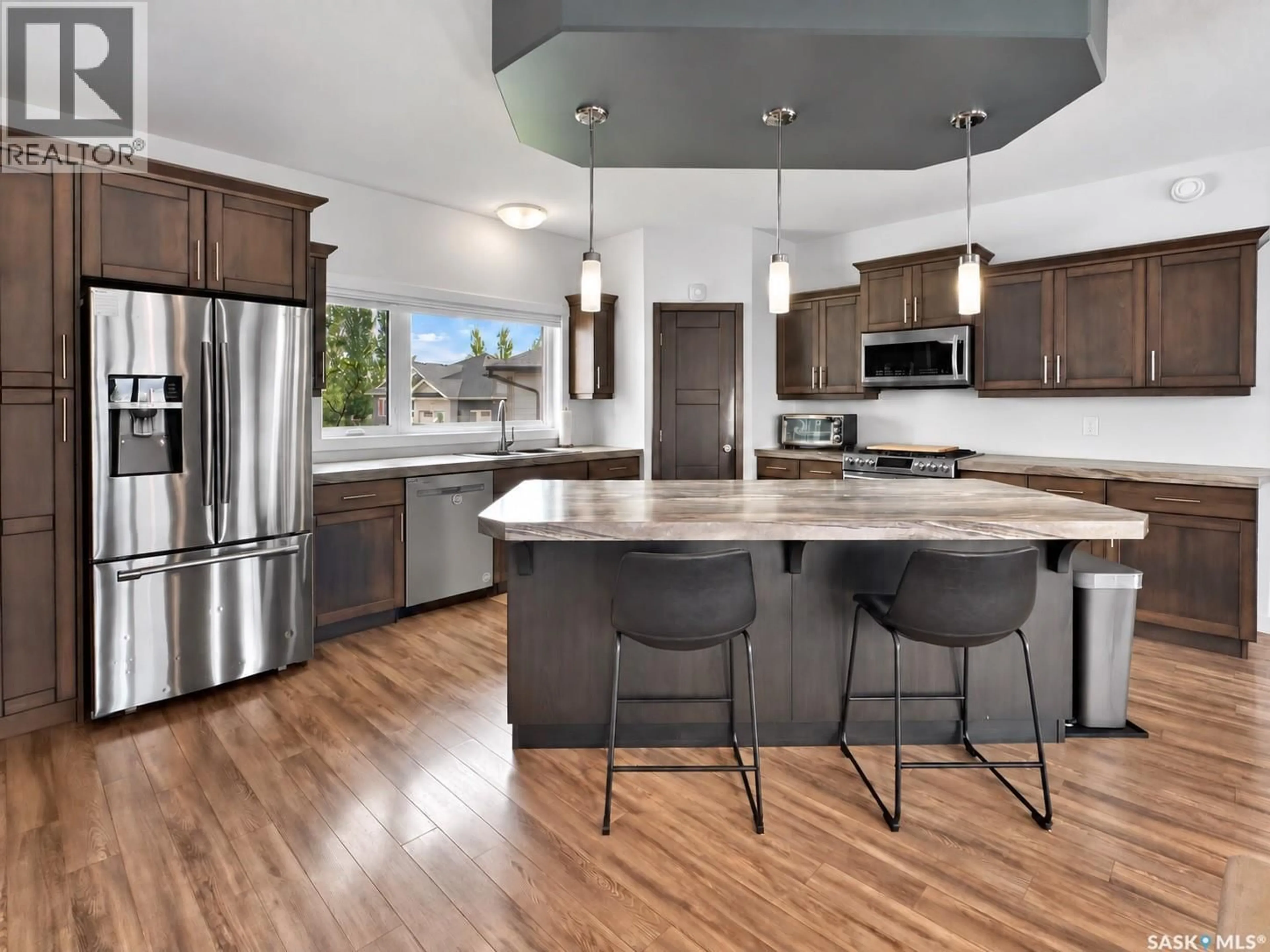 Open concept kitchen, unknown for 5 MACDONNELL COURT, Battleford Saskatchewan S0M0E0