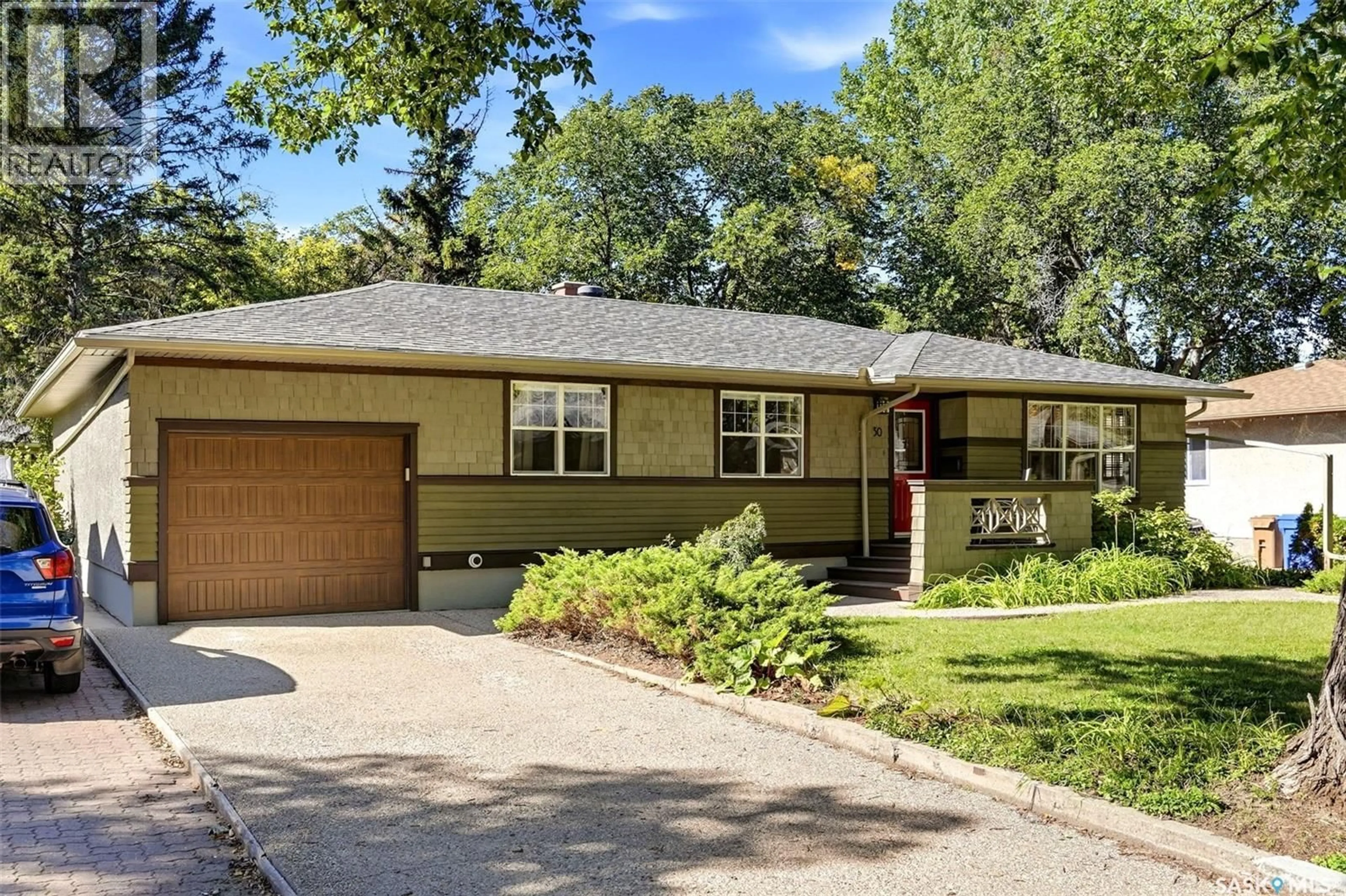 Home with vinyl exterior material, street for 30 LAKE STREET, Regina Saskatchewan S4S4A8