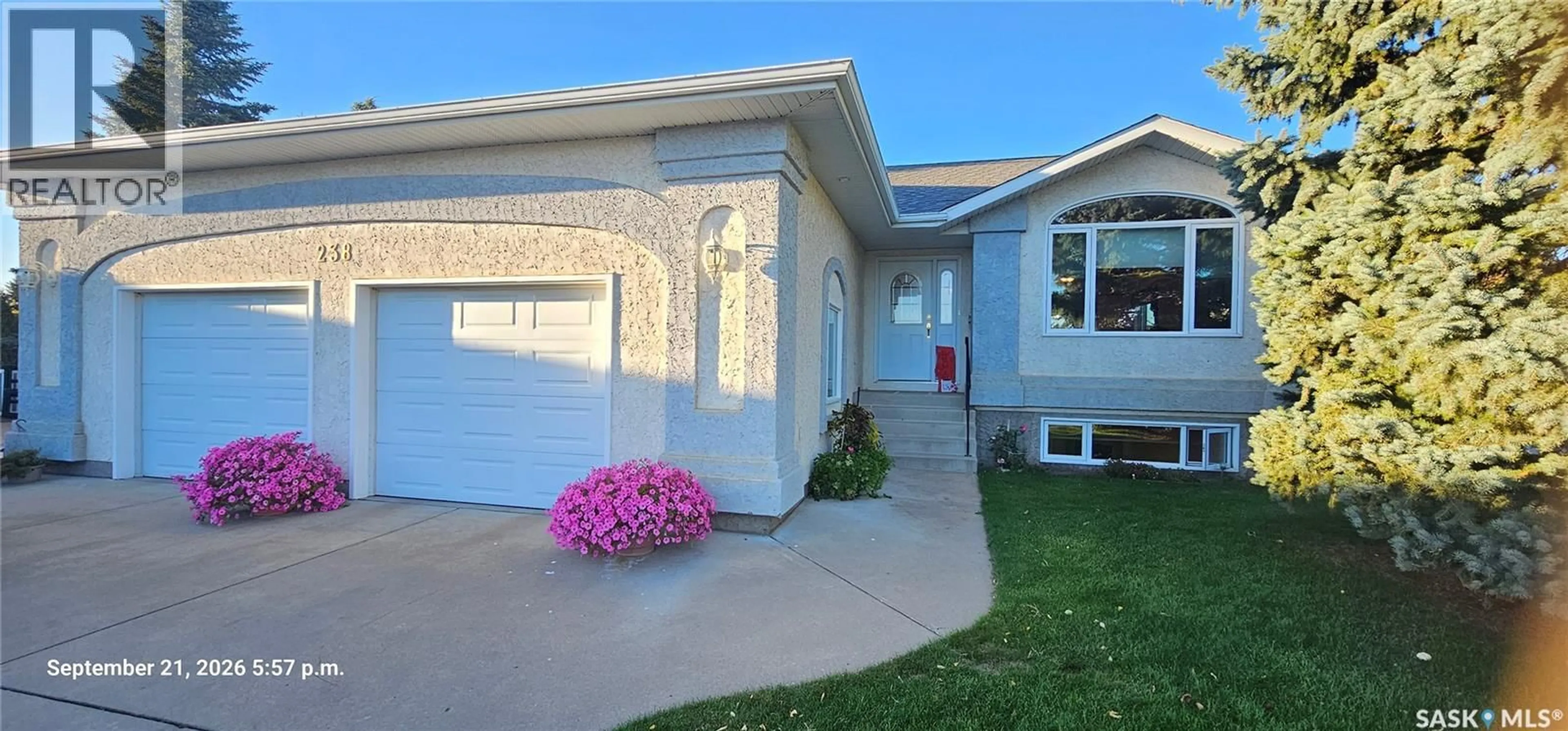 Home with vinyl exterior material, street for 238 MCKAY COURT, Warman Saskatchewan S0K4S0