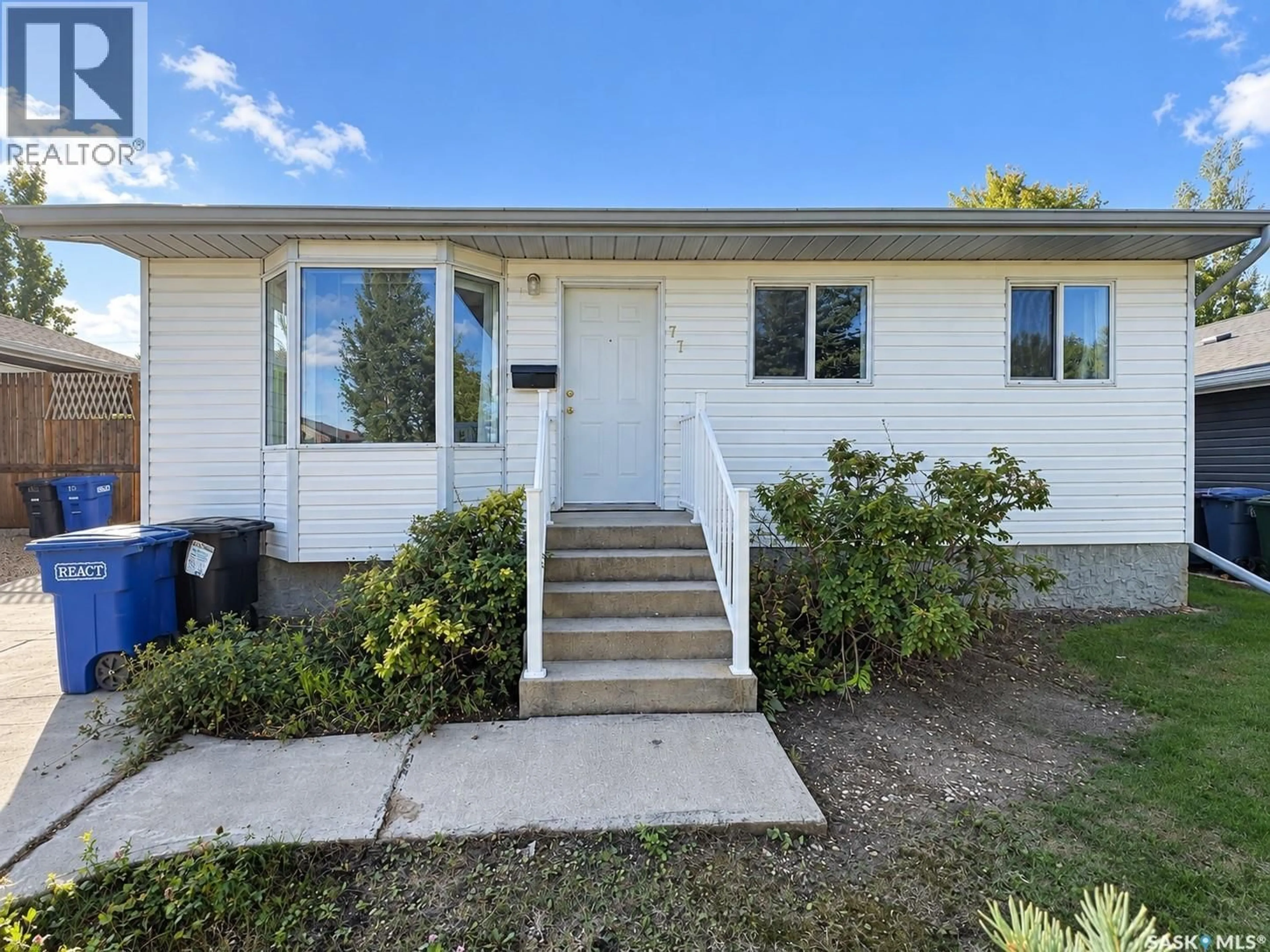 Home with vinyl exterior material, street for 77 3RD STREET, Humboldt Saskatchewan S0K2A0