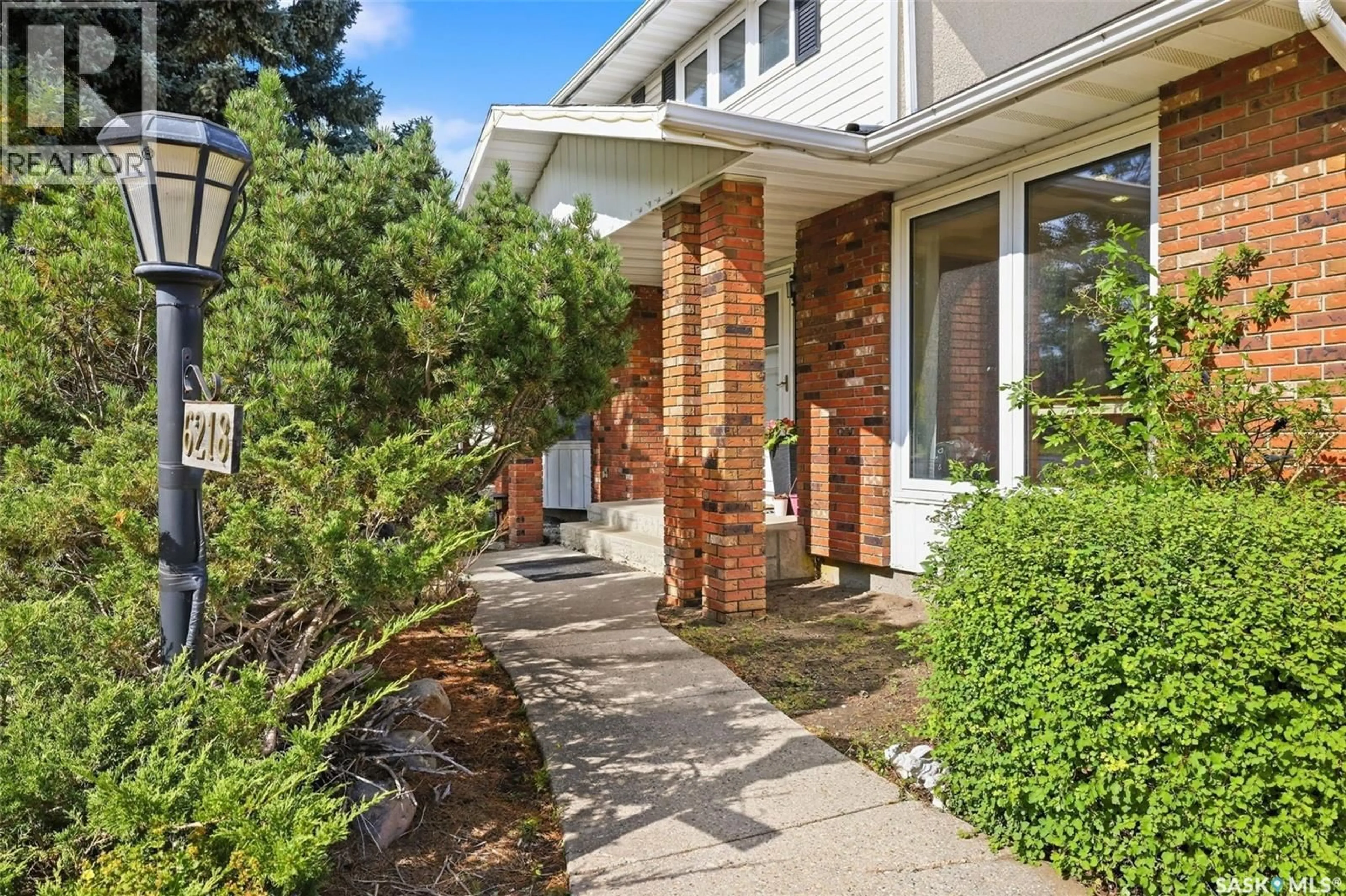 Home with brick exterior material, street for 6218 SHERWOOD DRIVE, Regina Saskatchewan S4T7G2