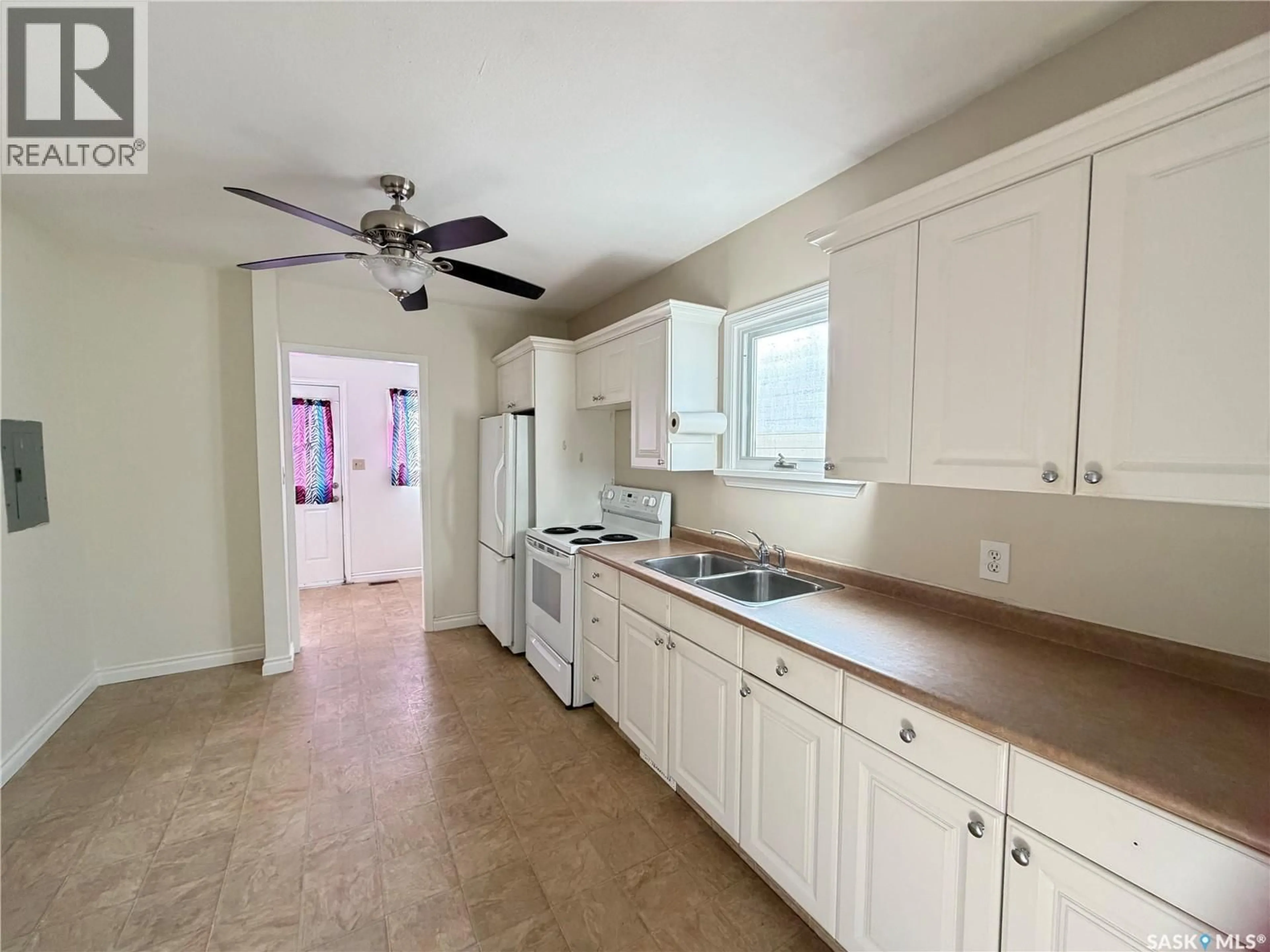 Standard kitchen, ceramic/tile floor for 1215 BRODER STREET, Regina Saskatchewan S4N3R3