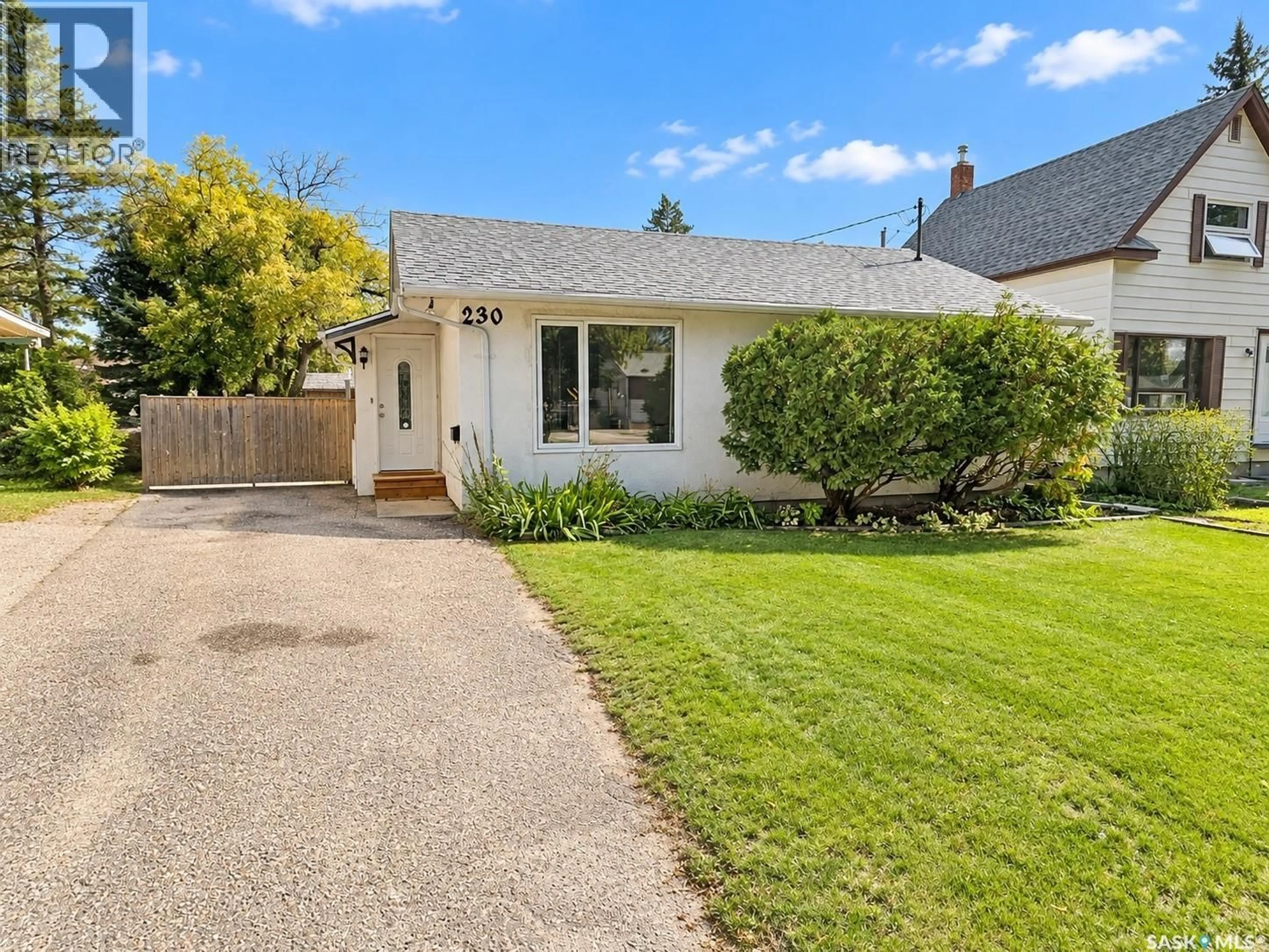 A pic from outside/outdoor area/front of a property/back of a property/a pic from drone, street for 230 10TH STREET, Weyburn Saskatchewan S4H2W3