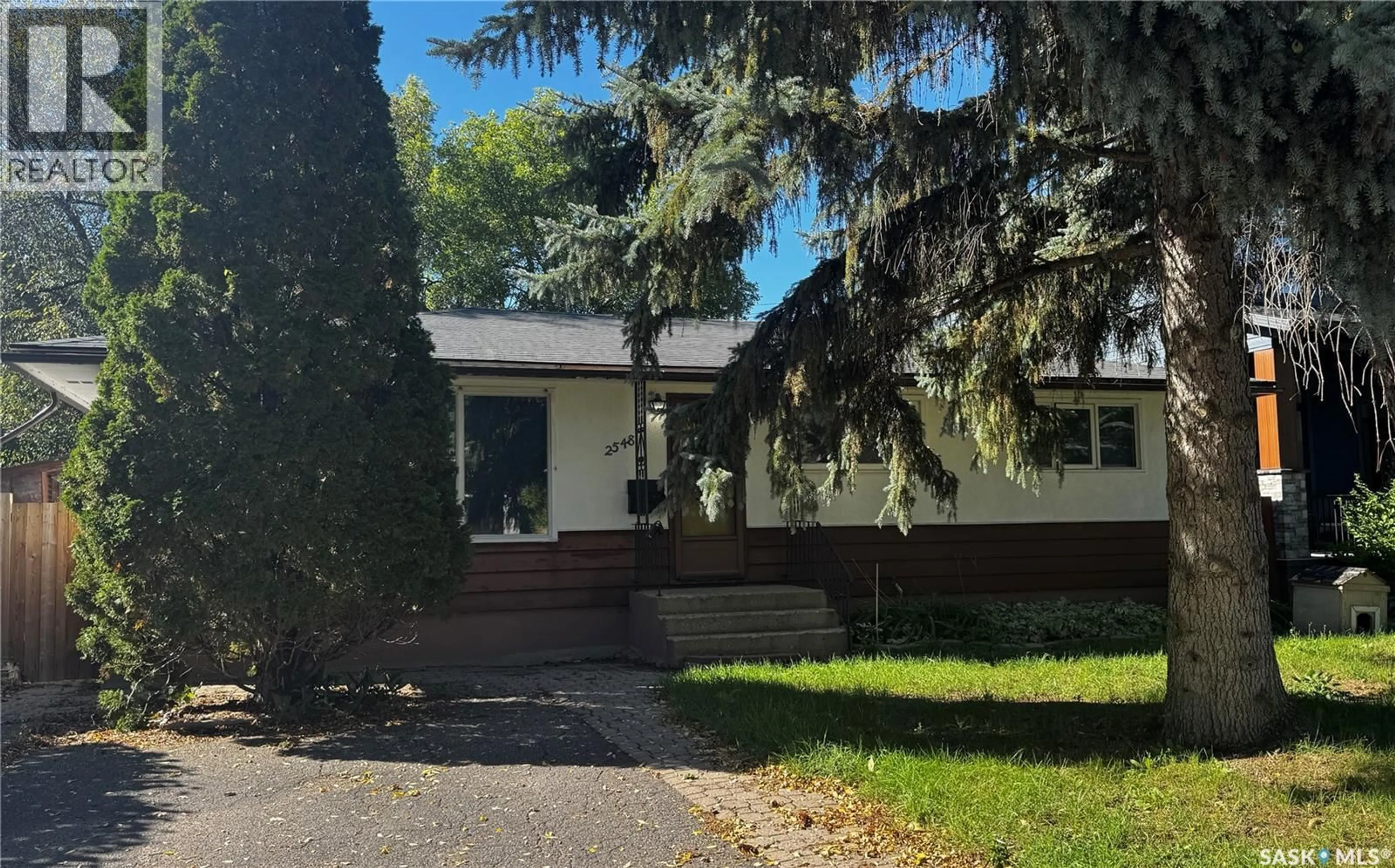Home with vinyl exterior material, street for 2548 GARNET STREET, Regina Saskatchewan S4T3A5