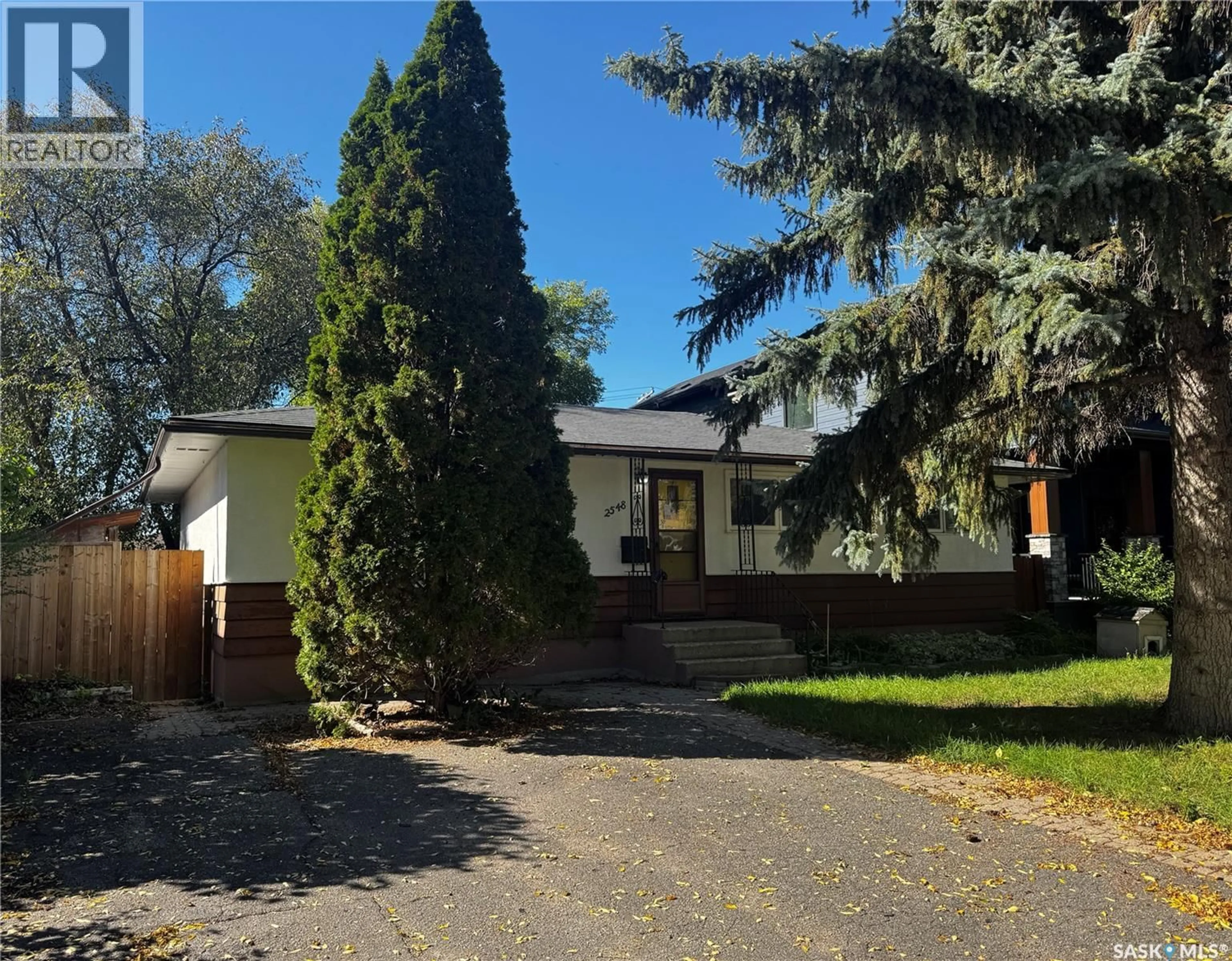 Home with vinyl exterior material, street for 2548 GARNET STREET, Regina Saskatchewan S4T3A5