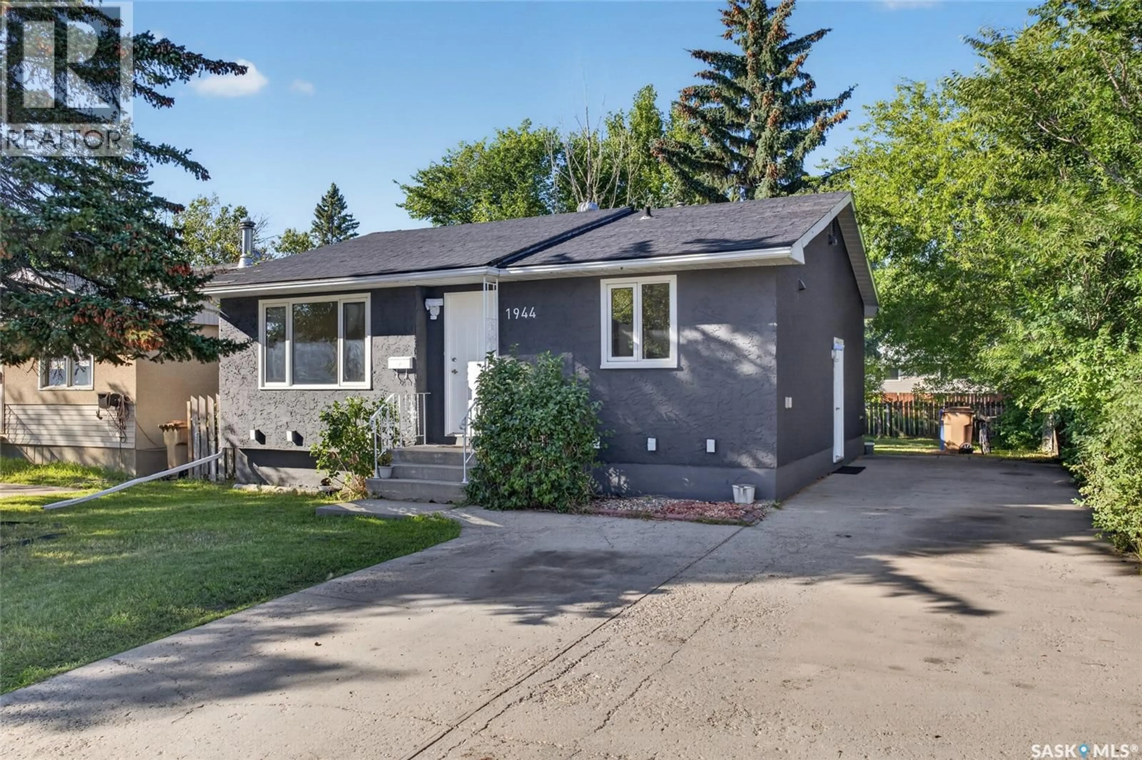Home with vinyl exterior material, street for 1944 DEWDNEY AVENUE, Regina Saskatchewan S4N4C8
