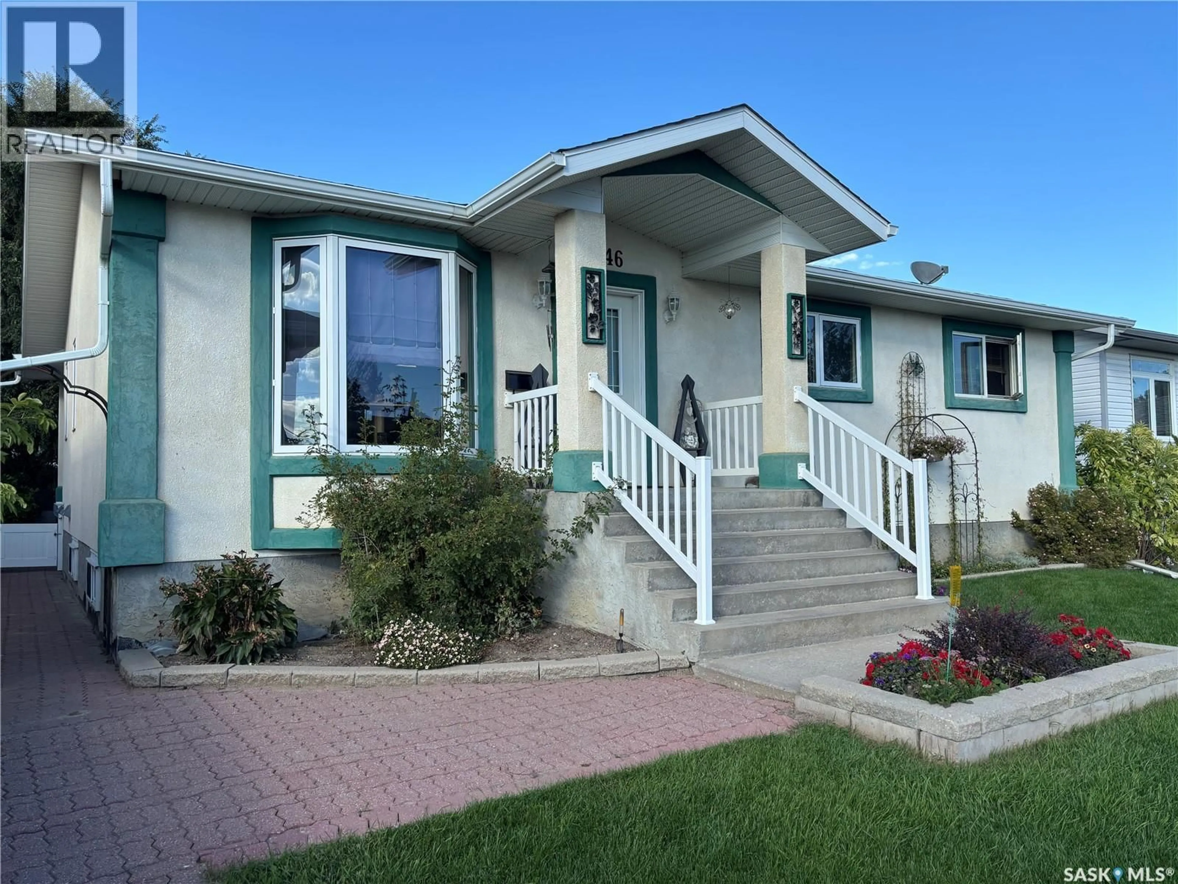 Home with vinyl exterior material, street for 1546 ATHABASCA STREET, Moose Jaw Saskatchewan S6H7K4