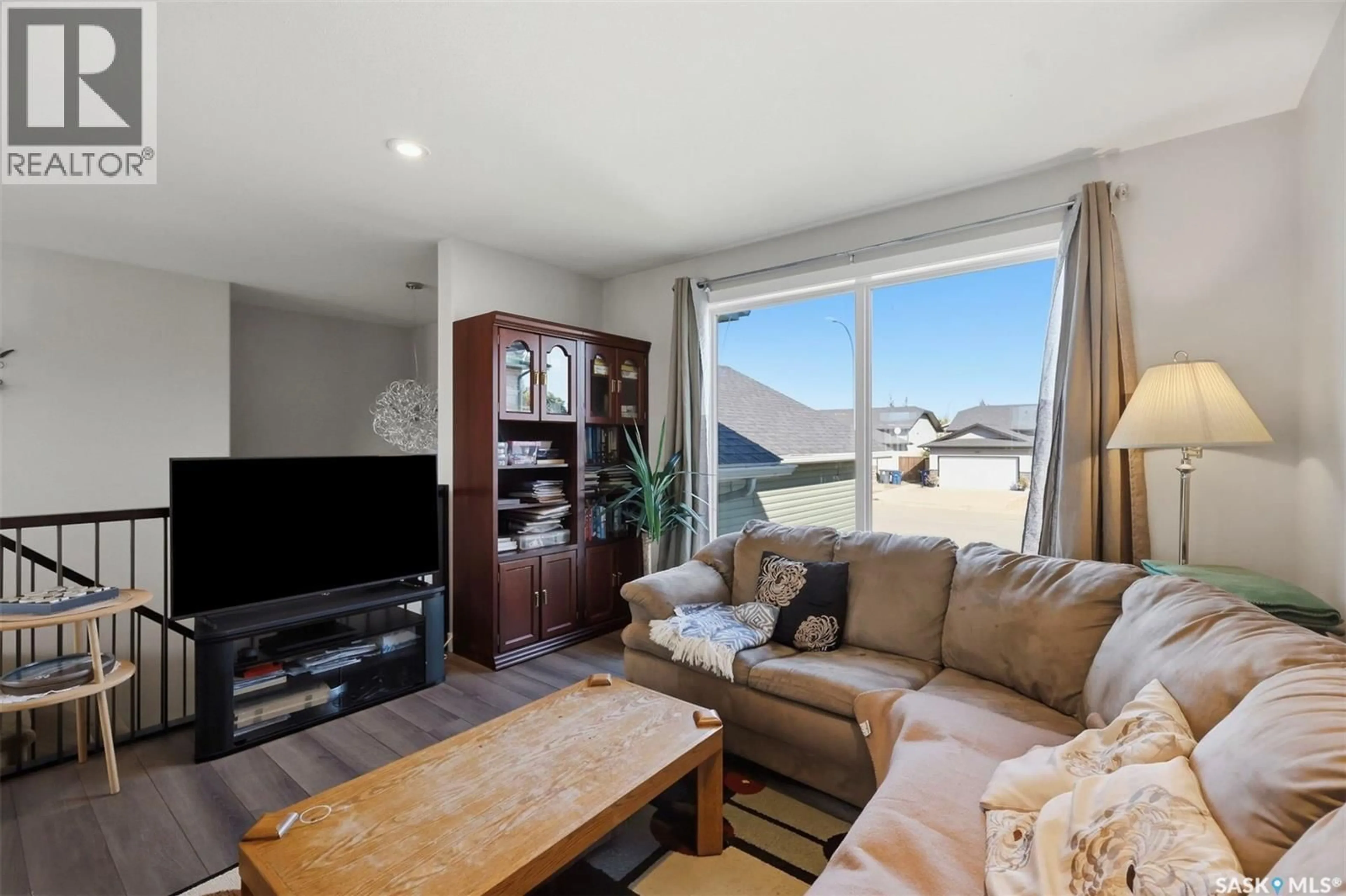 Living room with furniture, unknown for 301 HAICHERT STREET, Warman Saskatchewan S0K4S0