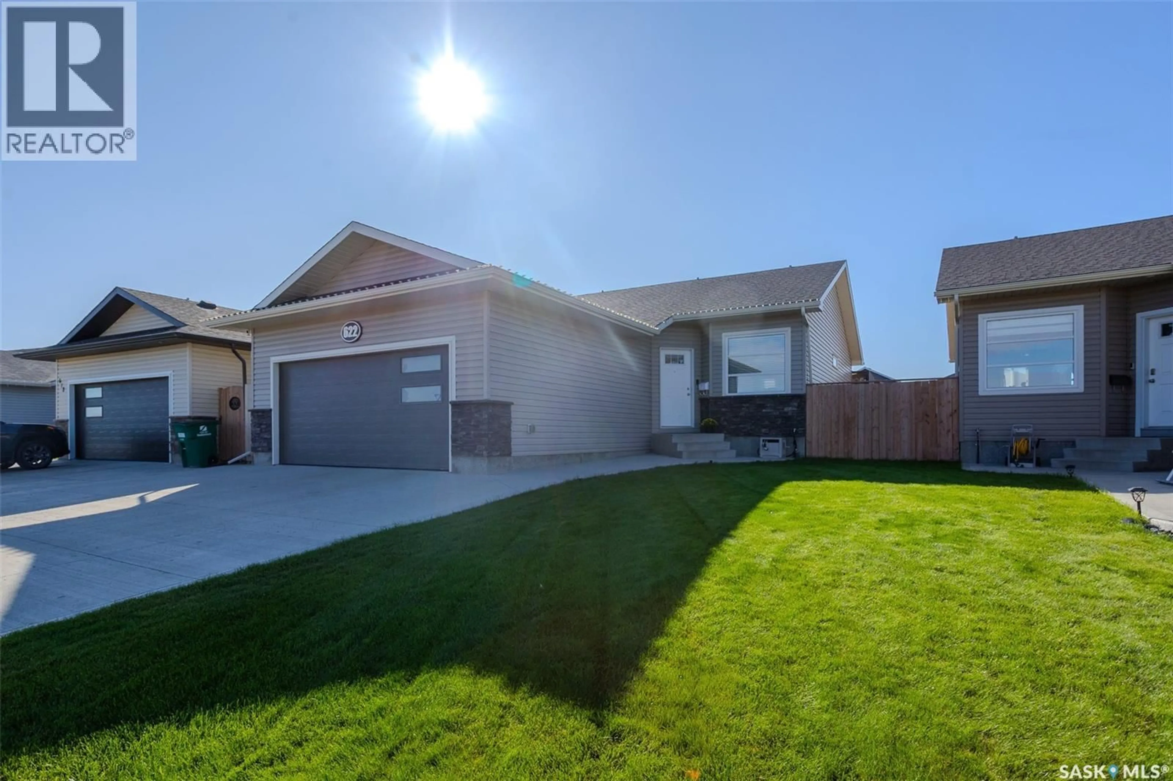 Home with vinyl exterior material, street for 622 ROSEWOOD BOULEVARD, Saskatoon Saskatchewan S7V0J7