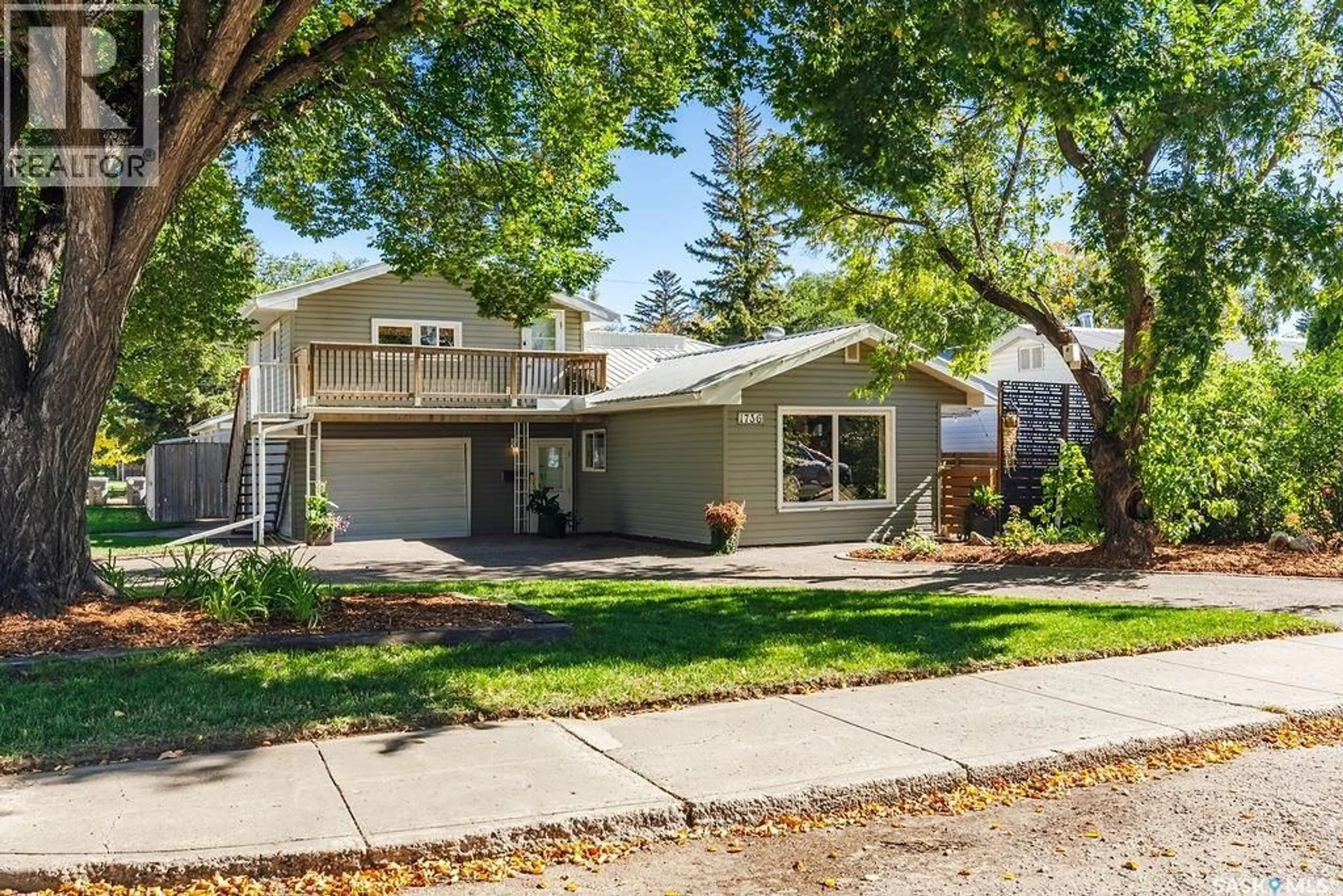 Home with vinyl exterior material, street for 1736 1ST AVENUE, Saskatoon Saskatchewan S7K1Z6