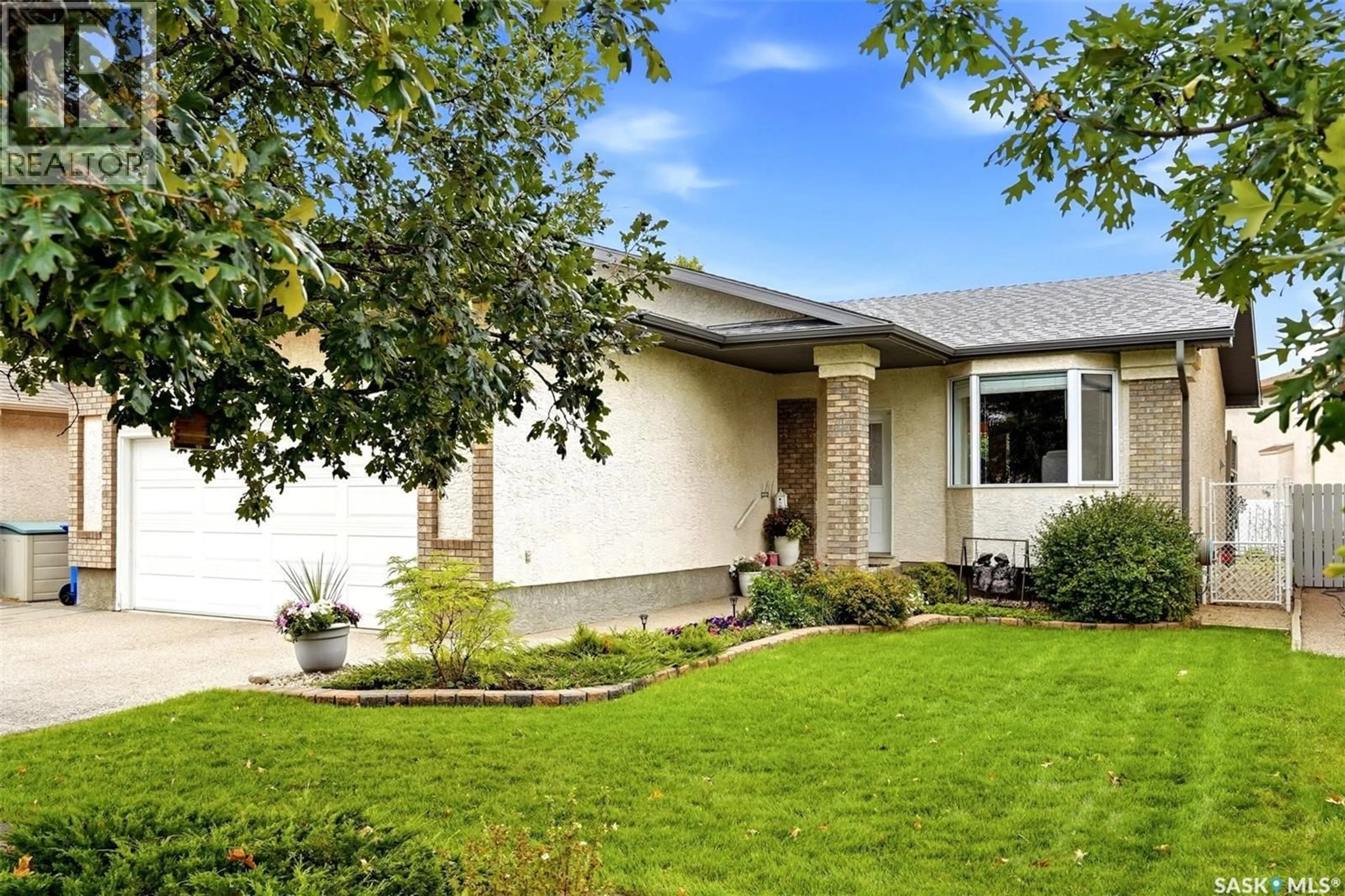 Home with vinyl exterior material, street for 5120 HOLASH WAY, Regina Saskatchewan S4X4M3