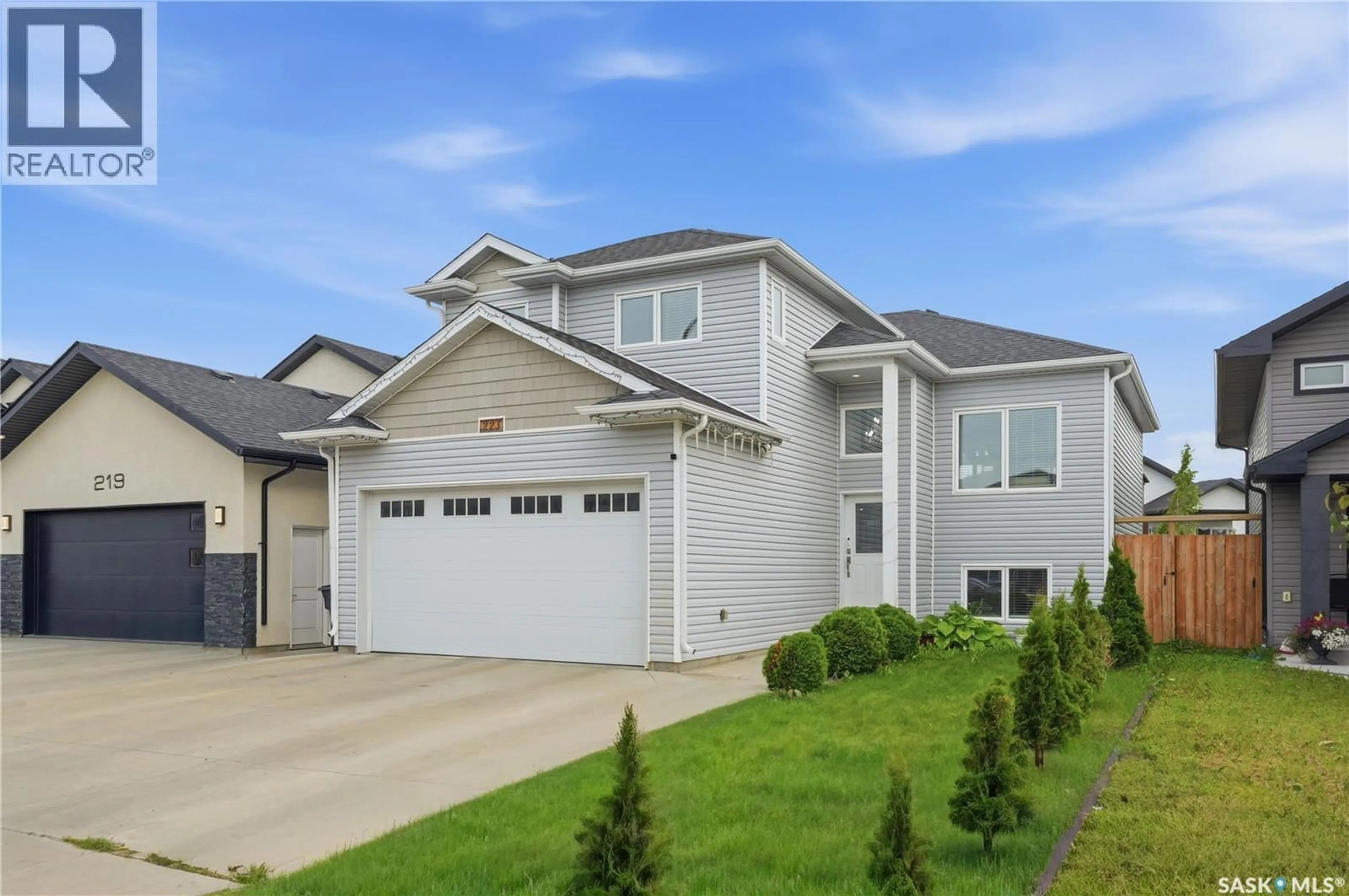 Home with vinyl exterior material, street for 223 ELLS CRESCENT, Saskatoon Saskatchewan S7L6K6