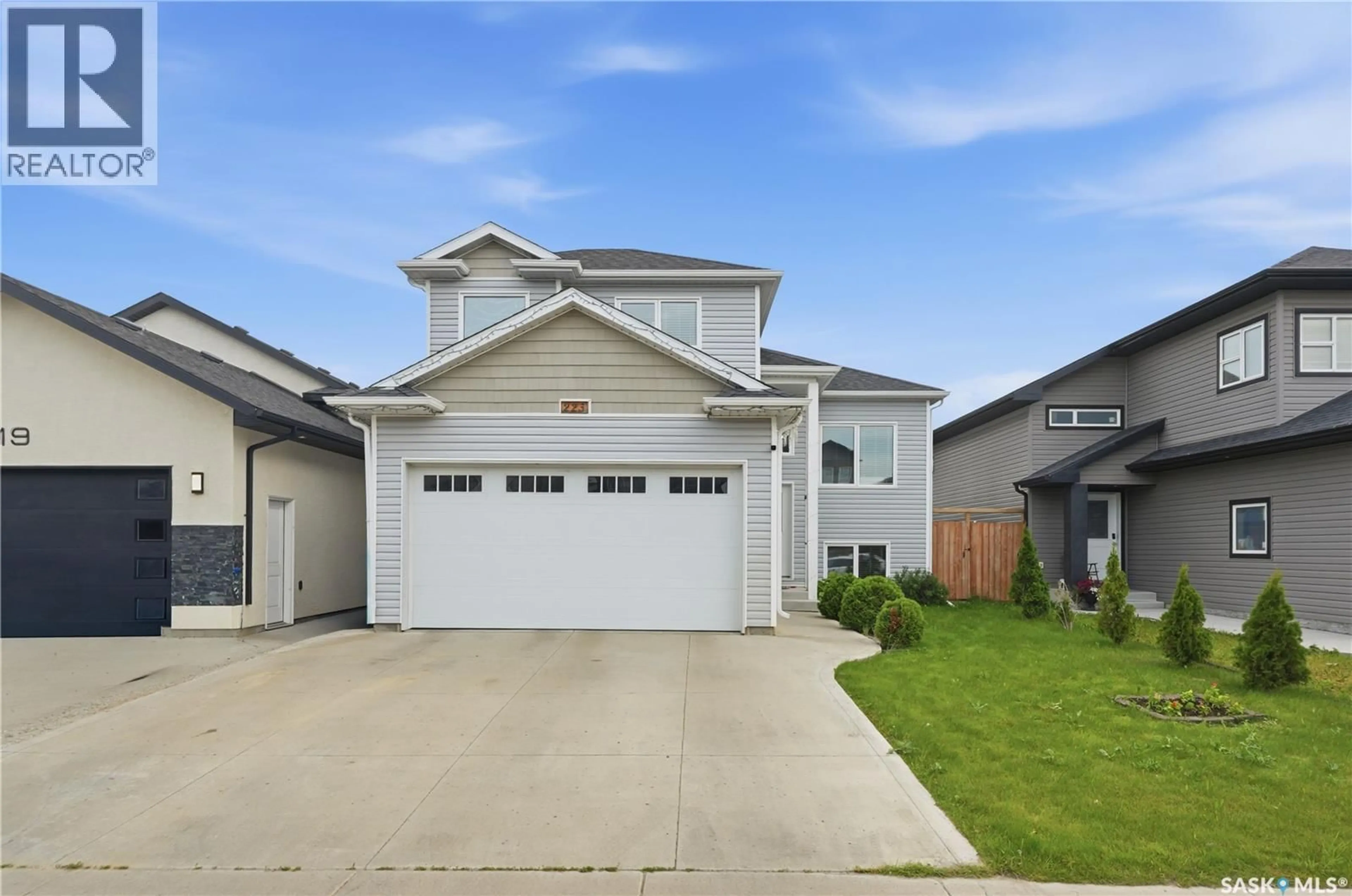 Home with vinyl exterior material, street for 223 ELLS CRESCENT, Saskatoon Saskatchewan S7L6K6
